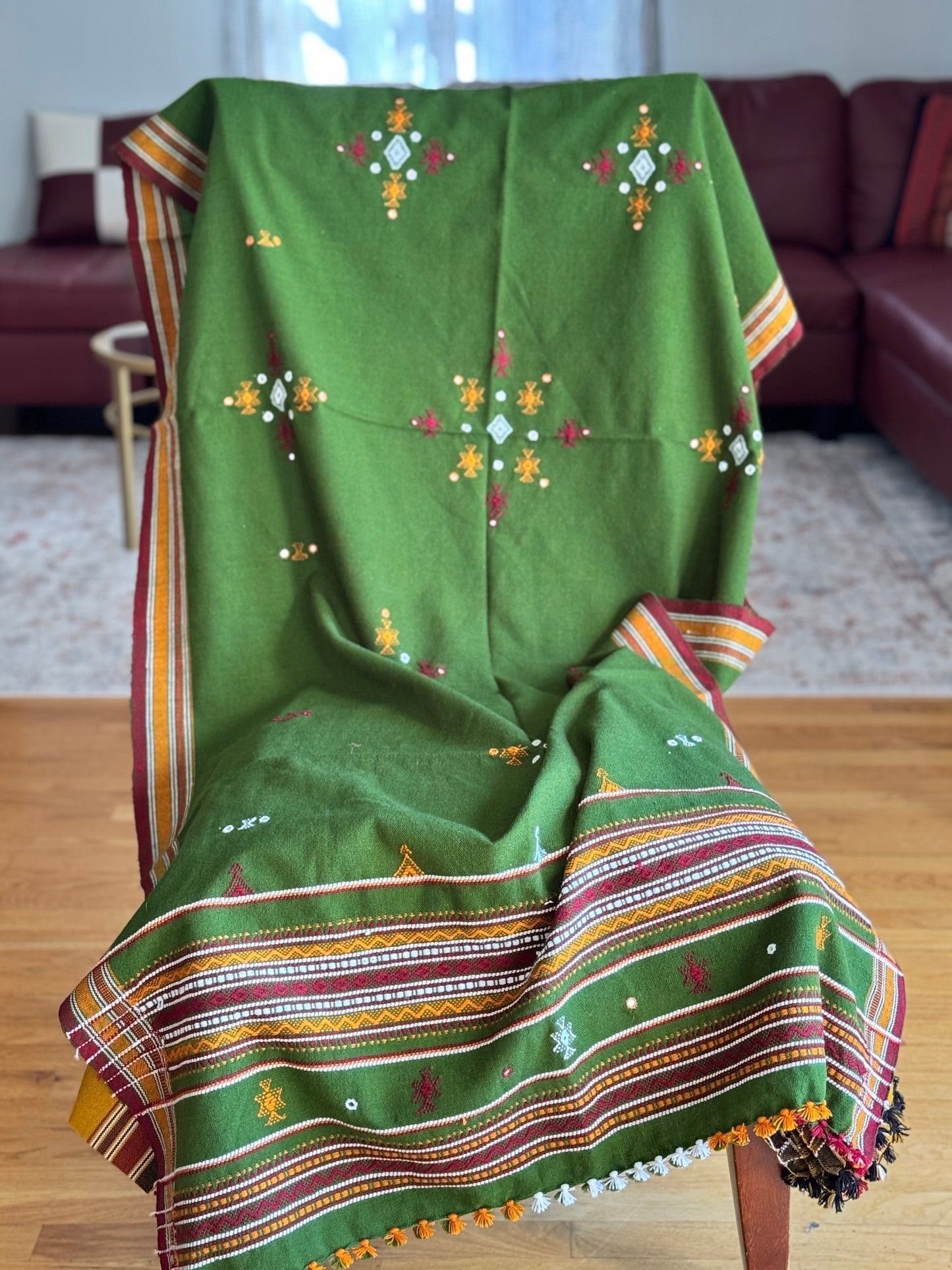 Handcrafted Kutchi embroidery pure sheep wool shawls, featuring intricate traditional patterns and vibrant threads, offering warmth and elegance with a cultural touch.