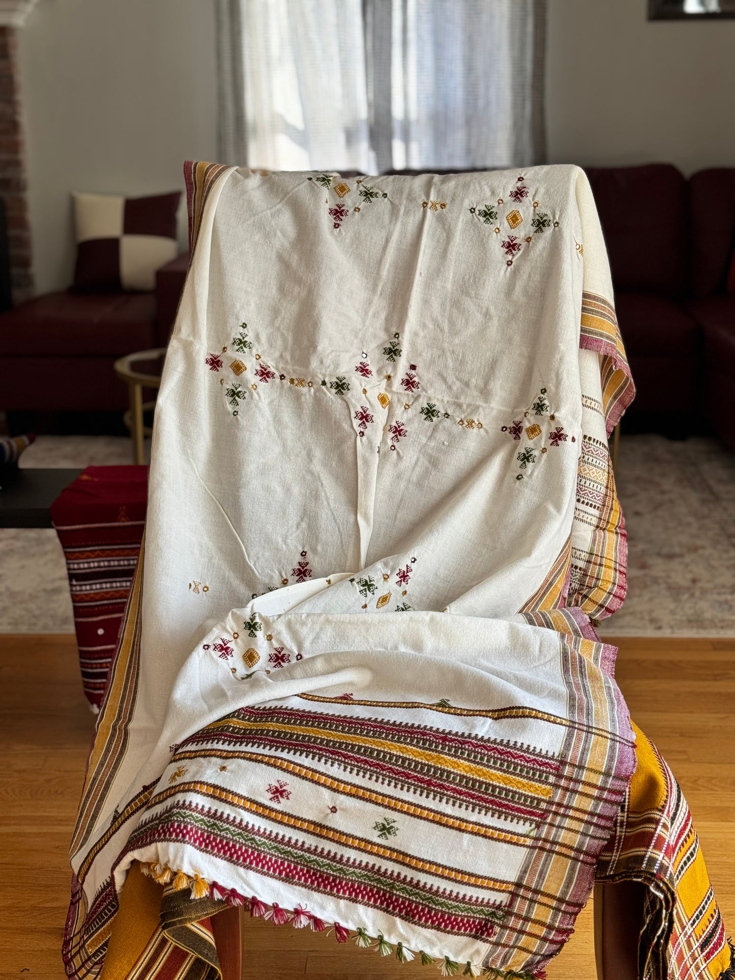 Handcrafted Kutchi embroidery pure sheep wool shawls, featuring intricate traditional patterns and vibrant threads, offering warmth and elegance with a cultural touch.