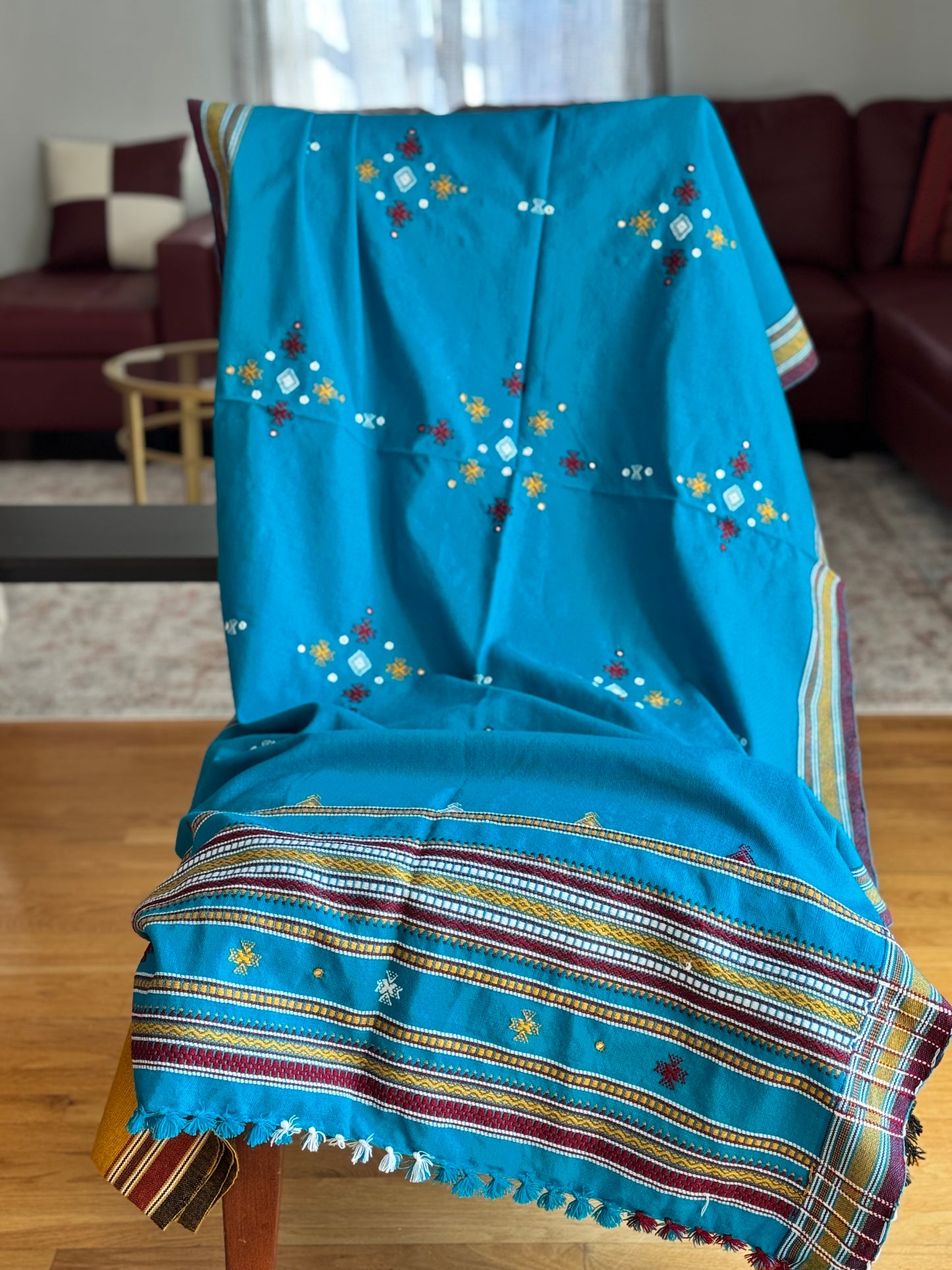 Handcrafted Kutchi embroidery pure sheep wool shawls, featuring intricate traditional patterns and vibrant threads, offering warmth and elegance with a cultural touch.