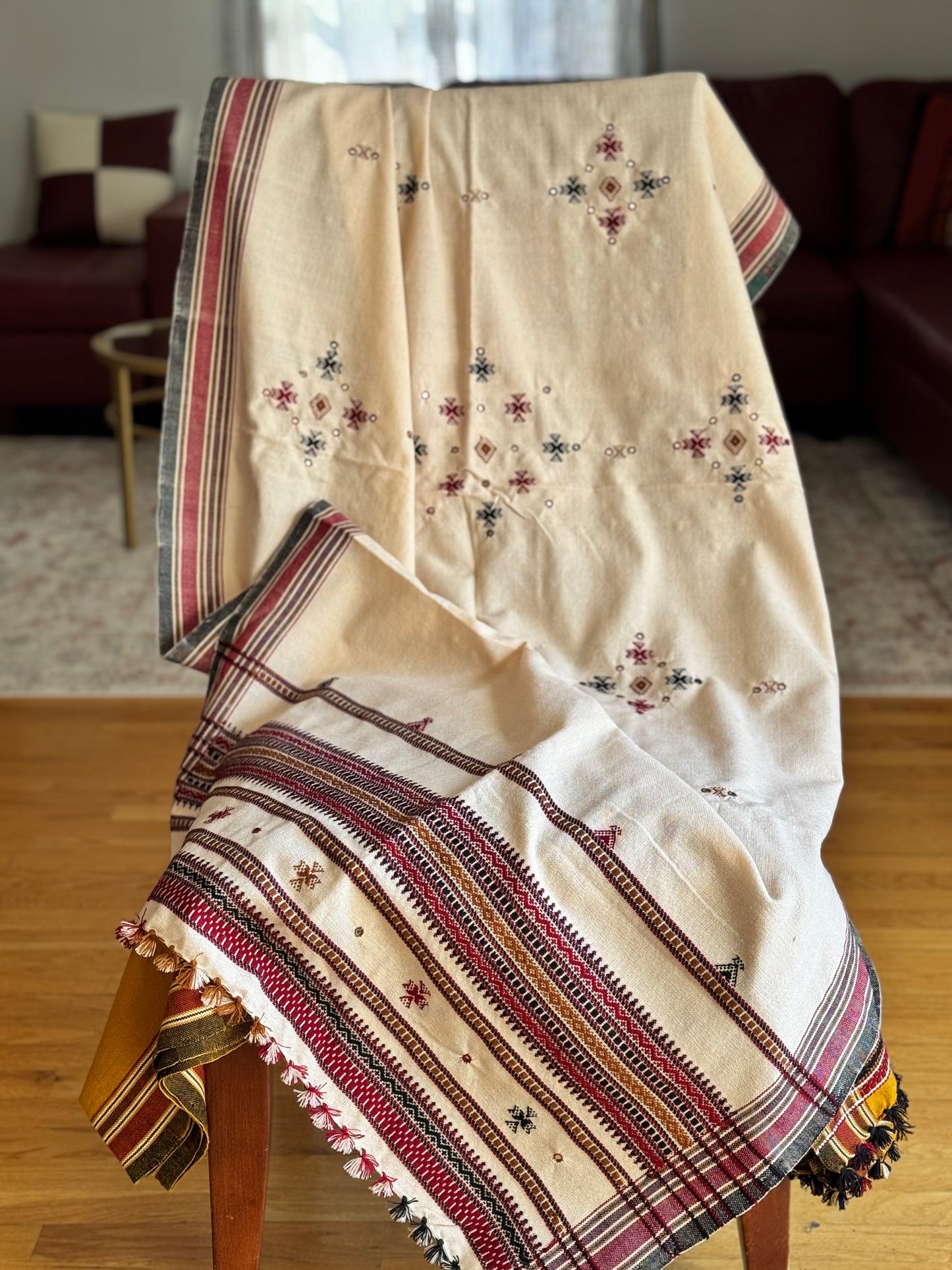 Handcrafted Kutchi embroidery pure sheep wool shawls, featuring intricate traditional patterns and vibrant threads, offering warmth and elegance with a cultural touch.