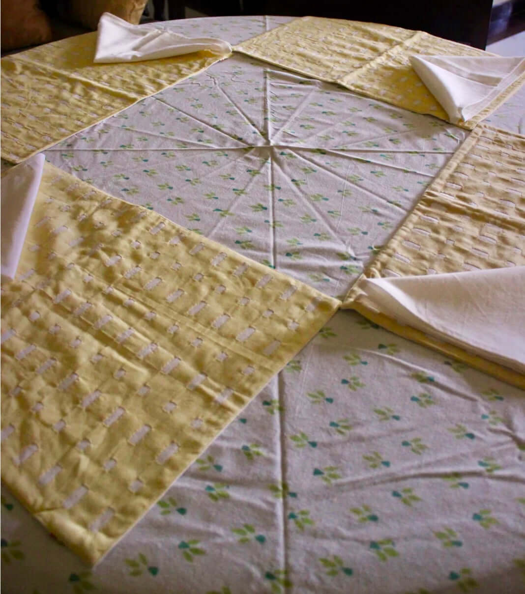 Handcrafted Appliqué work on placemats and napkins set, featuring intricate designs and vibrant colors. A beautiful fusion of traditional craftsmanship and modern elegance to enhance your dining experience.