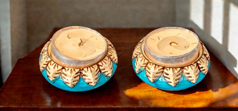 Handcrafted Jaipur Blue Pottery tea light holders, featuring intricate designs and vibrant blue hues, adding a traditional Indian touch to your home decor.
