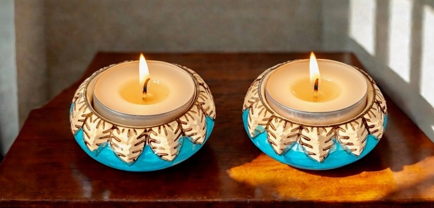 Handcrafted Jaipur Blue Pottery tea light holders, featuring intricate designs and vibrant blue hues, adding a traditional Indian touch to your home decor.