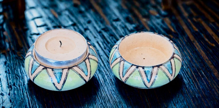 Handcrafted Jaipur Blue Pottery tea light holders, featuring intricate designs and vibrant blue hues, adding a traditional Indian touch to your home decor.