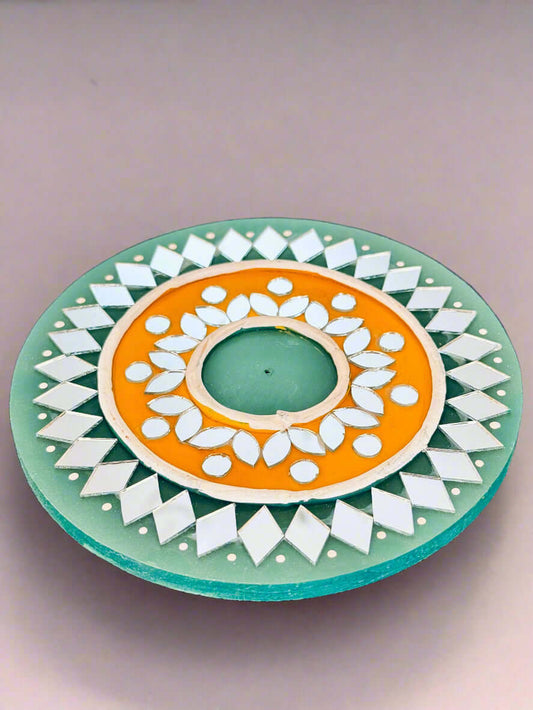 Handcrafted Lippankaam (Mud and Mirror Work) tea light holders and coasters, featuring intricate mirror designs and textured mud patterns, bringing traditional Indian artistry to your home decor.