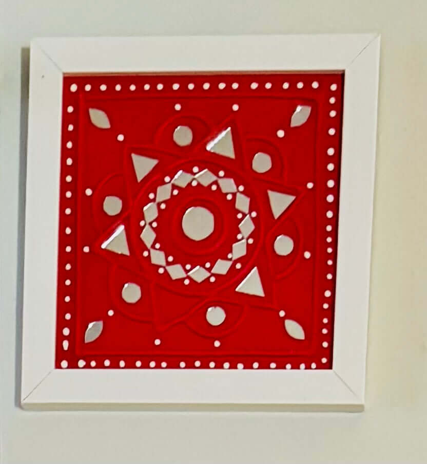 Handcrafted Lippankaam (Mud and Mirror Work) wall decor, featuring intricate mirror designs and textured mud patterns, adding a rustic and traditional Indian touch to your space.