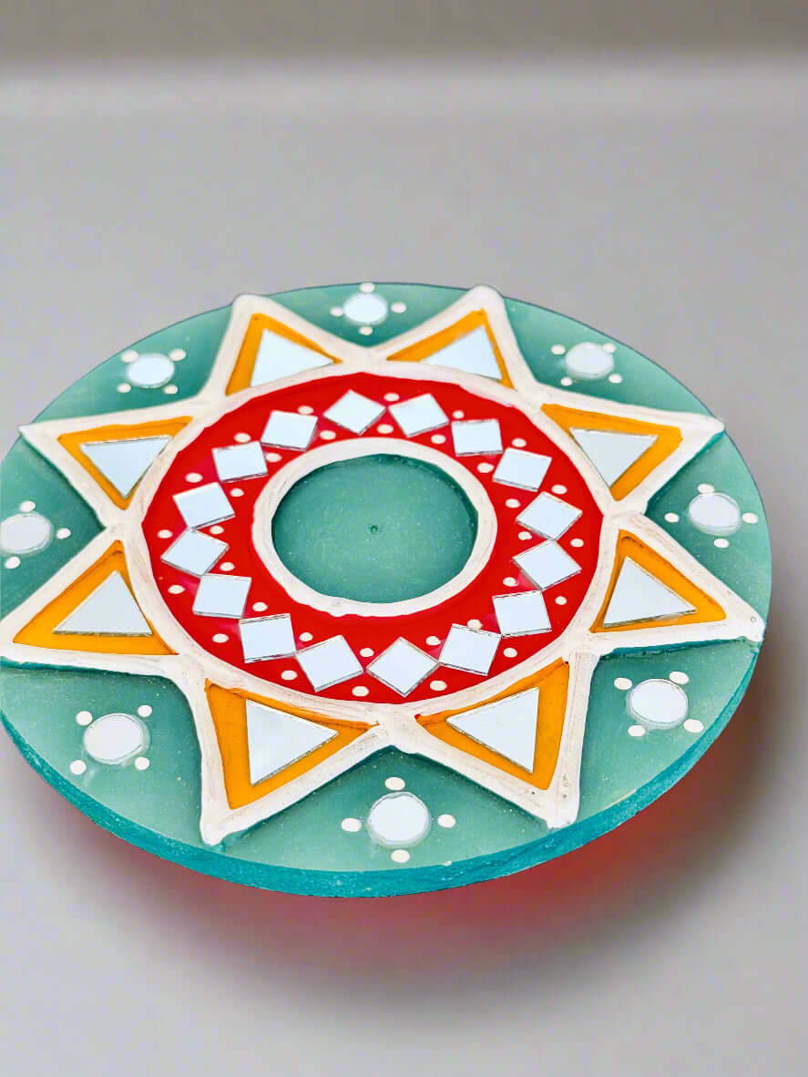 Handcrafted Lippankaam (Mud and Mirror Work) tea light holders and coasters, featuring intricate mirror designs and textured mud patterns, bringing traditional Indian artistry to your home decor.