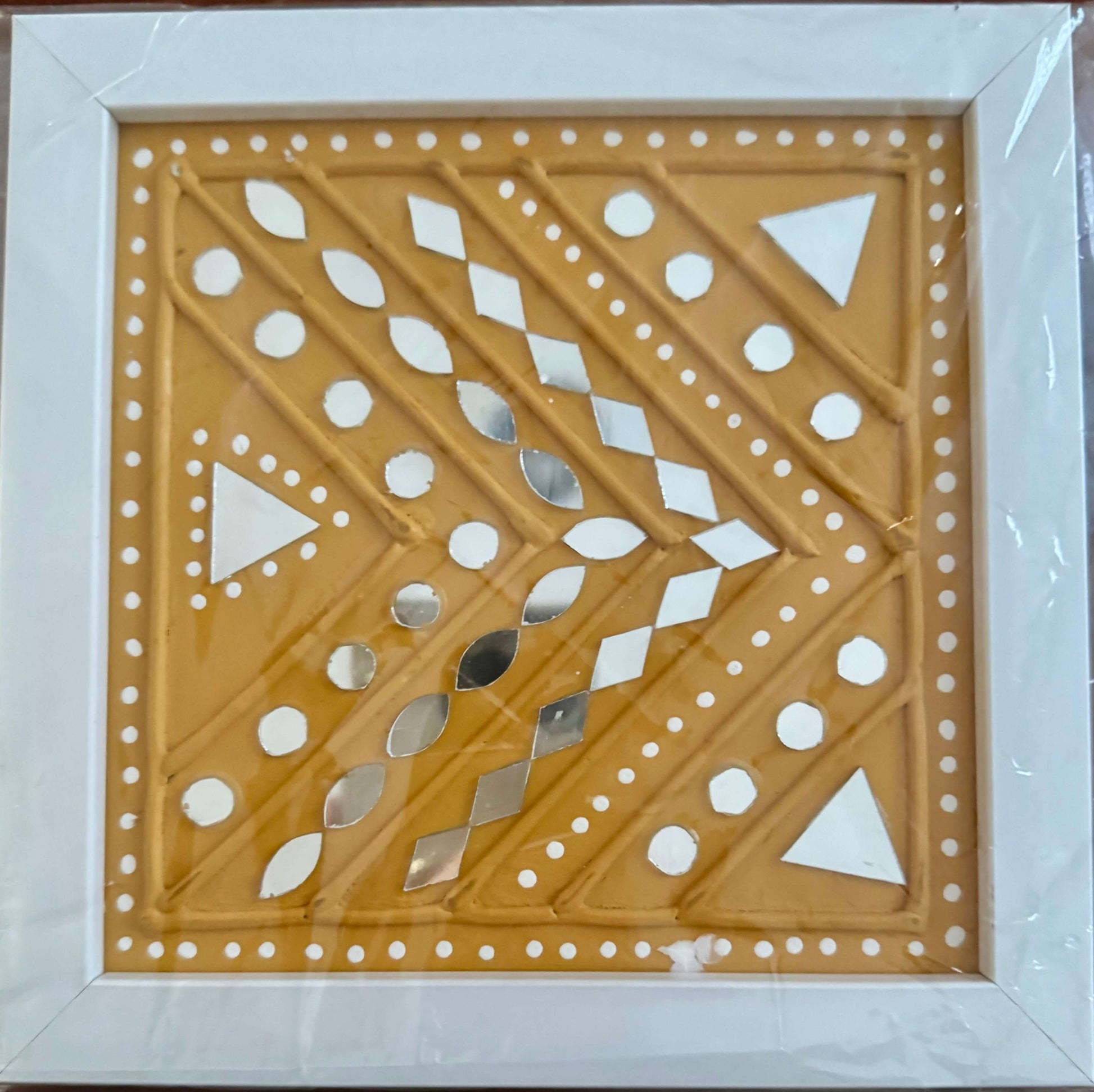 Handcrafted Lippankaam (Mud and Mirror Work) wall decor, featuring intricate mirror designs and textured mud patterns, adding a rustic and traditional Indian touch to your space.