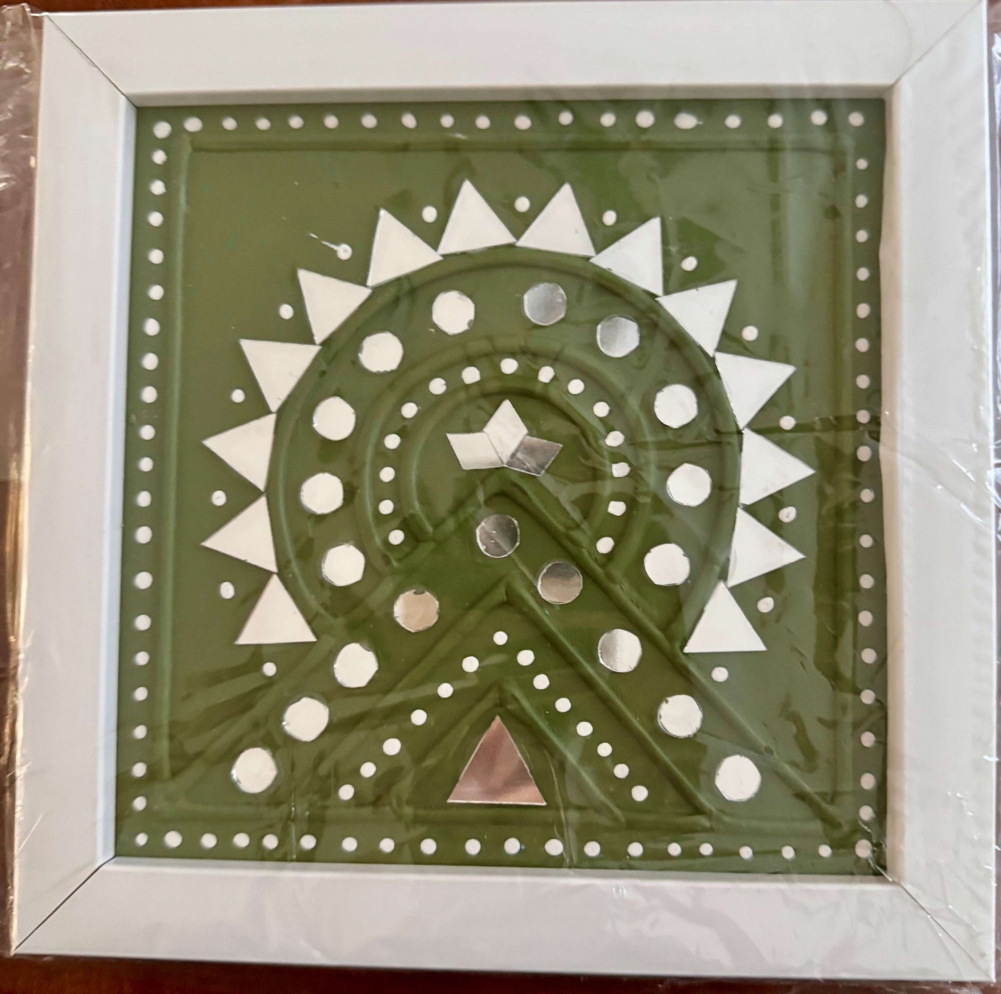 Handcrafted Lippankaam (Mud and Mirror Work) wall decor, featuring intricate mirror designs and textured mud patterns, adding a rustic and traditional Indian touch to your space.