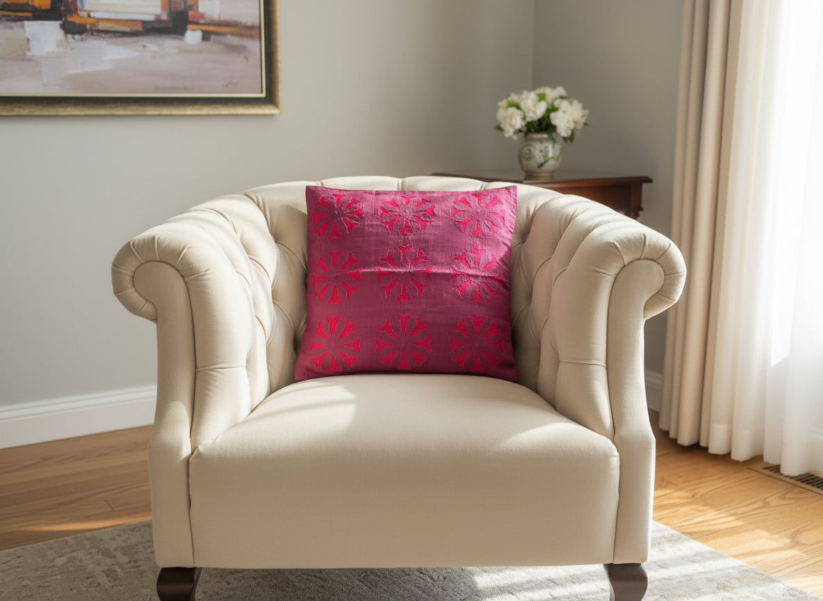 Handcrafted Appliqué work on cushion covers, showcasing vibrant designs and intricate stitching. A beautiful fusion of traditional craftsmanship and modern style, adding a unique touch to your living space.