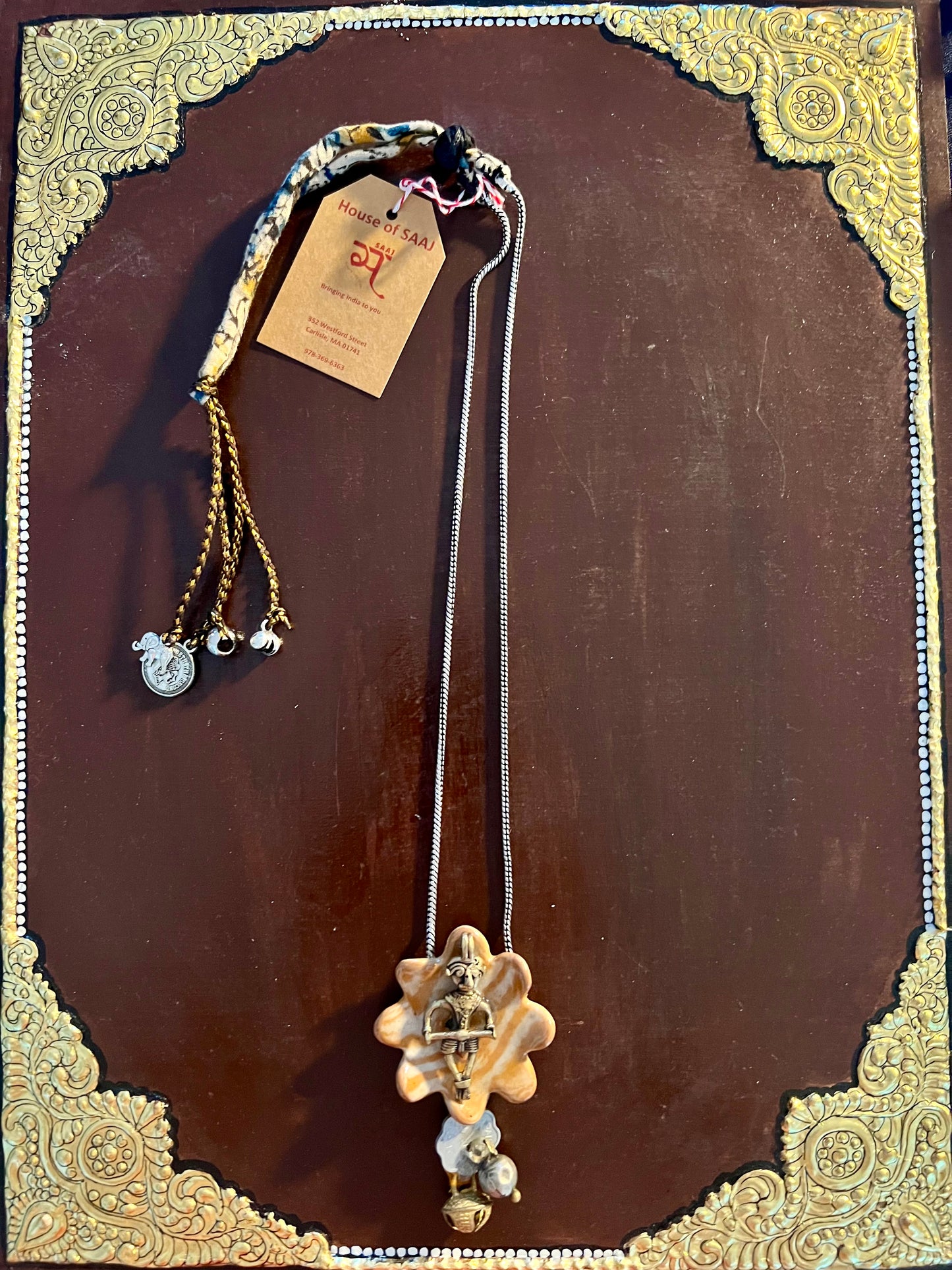 Eco-friendly upcycled handmade medium-sized pendant necklaces, featuring unique designs and sustainable materials, blending style with environmental consciousness.