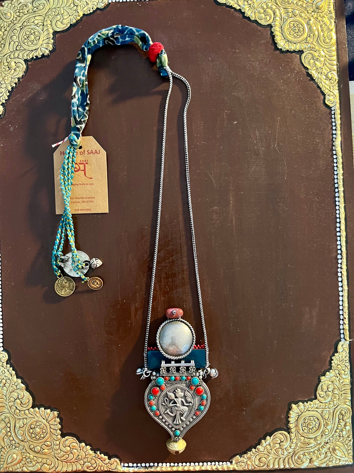 Eco-friendly upcycled handmade medium-sized pendant necklaces, featuring unique designs and sustainable materials, blending style with environmental consciousness.