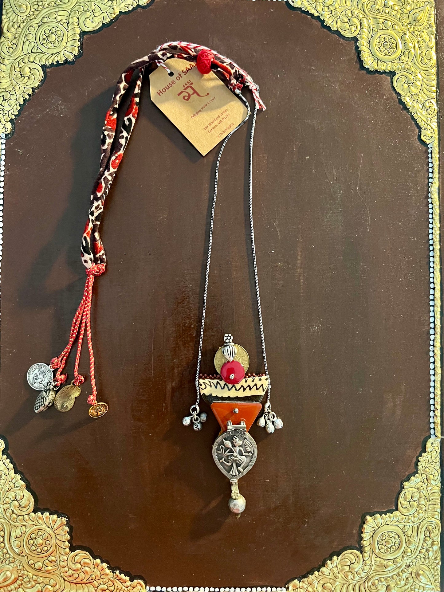 Eco-friendly upcycled handmade medium-sized pendant necklaces, featuring unique designs and sustainable materials, blending style with environmental consciousness.