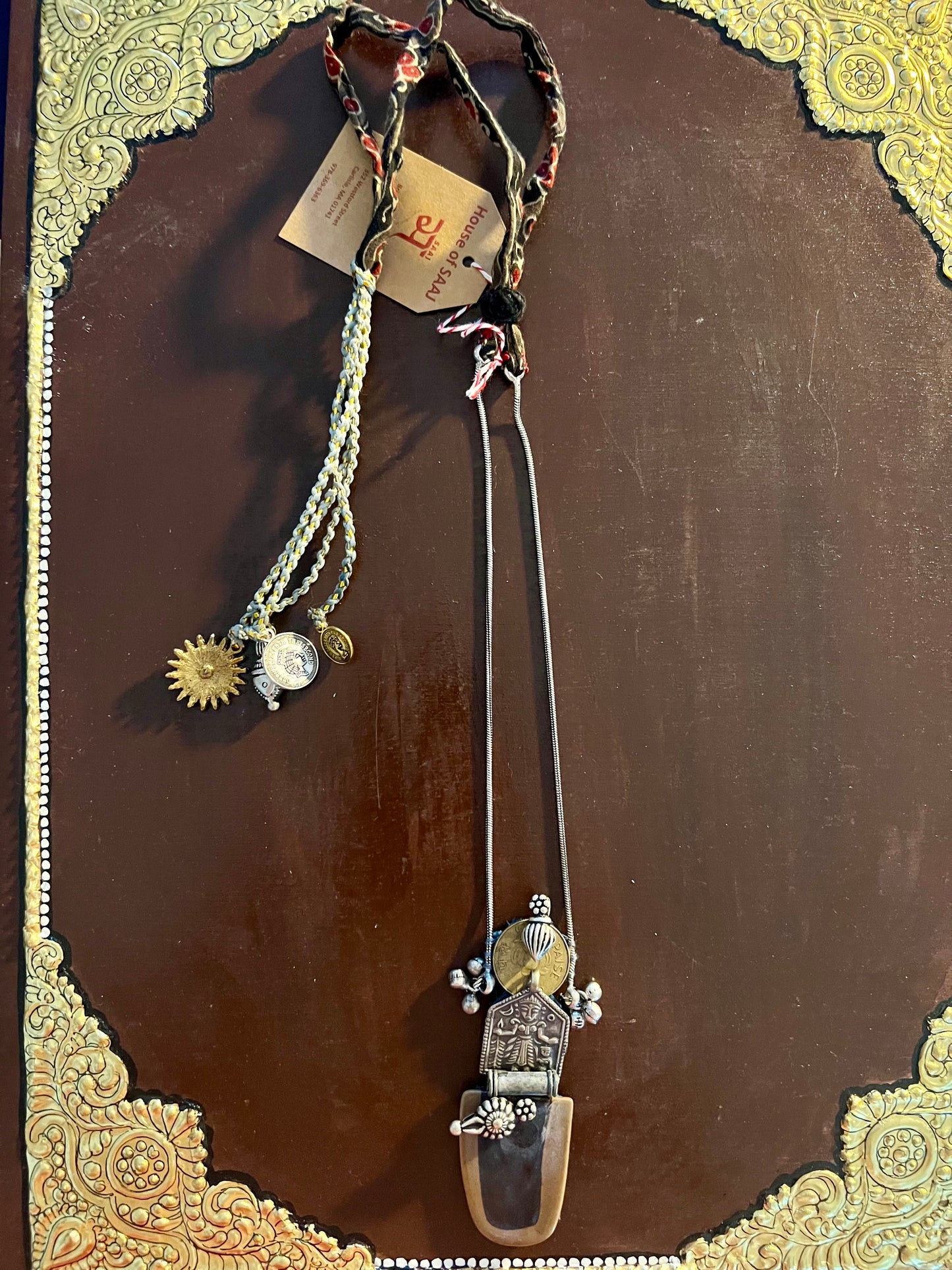 Eco-friendly upcycled handmade medium-sized pendant necklaces, featuring unique designs and sustainable materials, blending style with environmental consciousness.