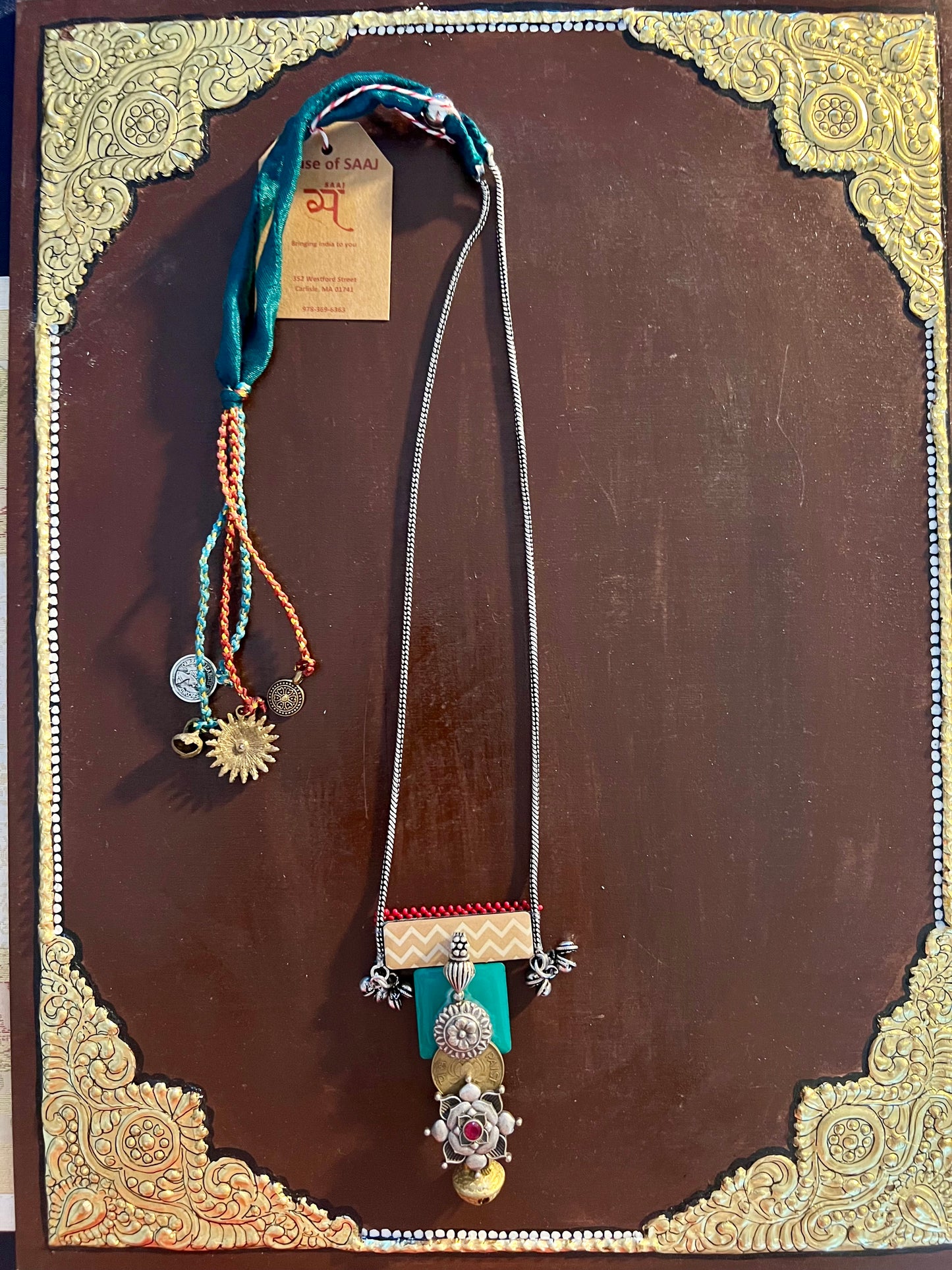 Eco-friendly upcycled handmade medium-sized pendant necklaces, featuring unique designs and sustainable materials, blending style with environmental consciousness.