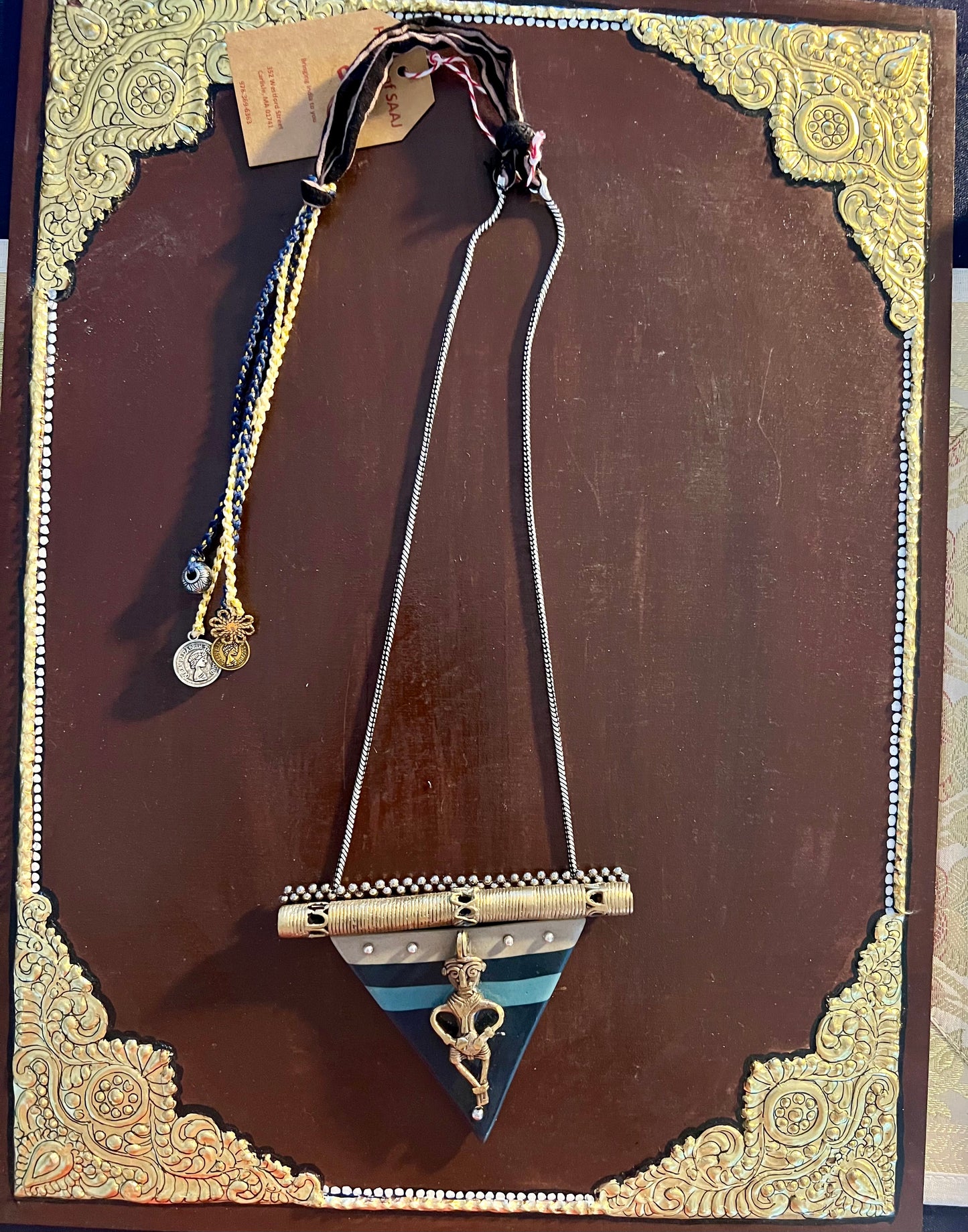 Eco-friendly upcycled handmade medium-sized pendant necklaces, featuring unique designs and sustainable materials, blending style with environmental consciousness.