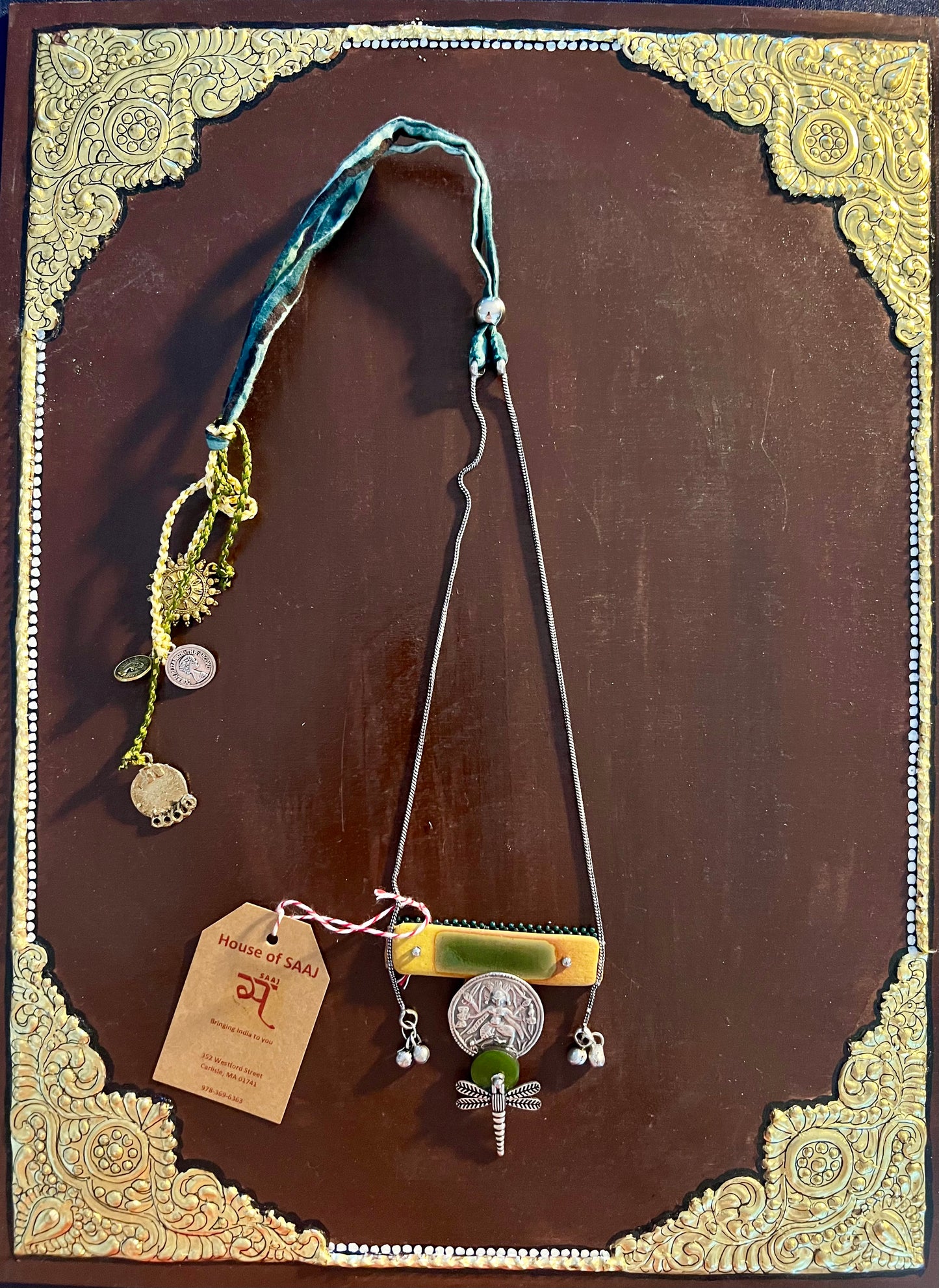 Eco-friendly upcycled handmade medium-sized pendant necklaces, featuring unique designs and sustainable materials, blending style with environmental consciousness.