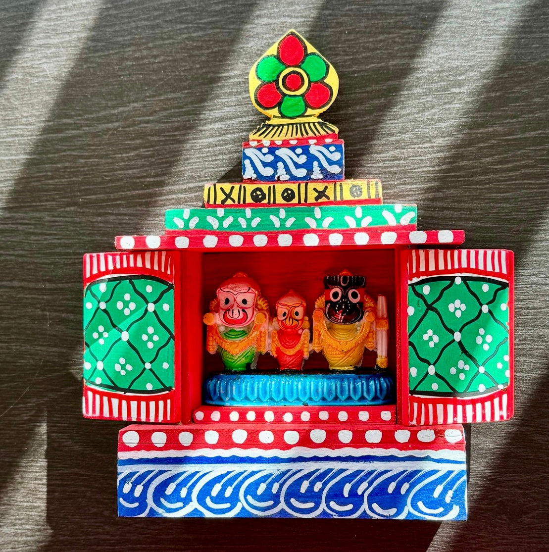 Exquisite Pattachitra art hand-painted on decorative items like Suparis, coconut balls, tea kettles, small Kulo baskets, and miniature mandirs. A vibrant showcase of intricate craftsmanship and cultural heritage for unique home decor.