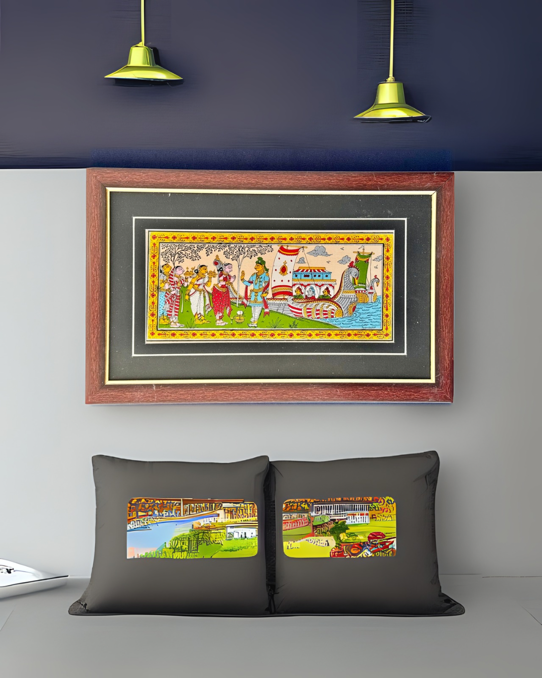 Framed Pattachitra art artwork on a wall with matching pillows below.