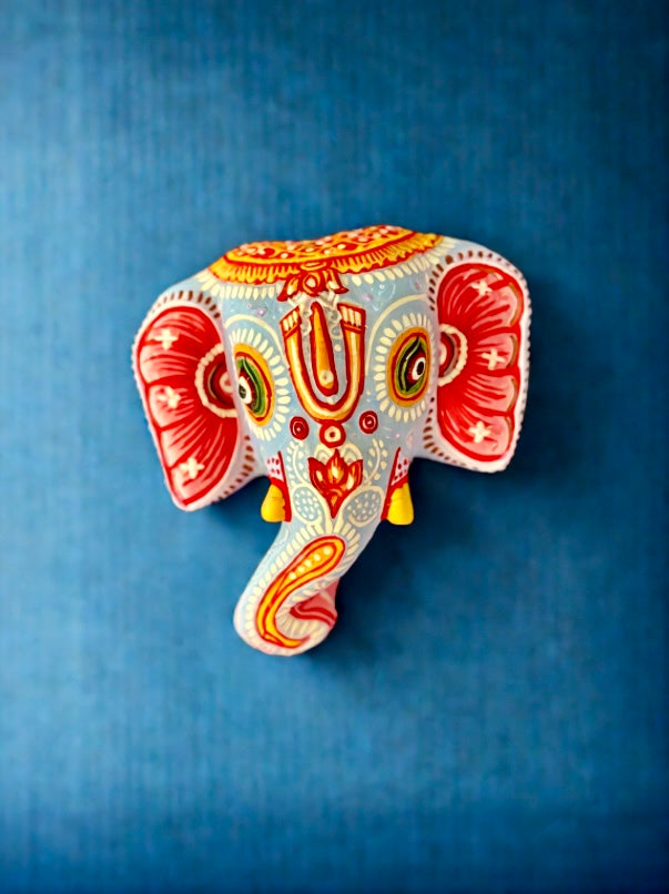 Exquisite Pattachitra art hand-painted on decorative items like Suparis, coconut balls, tea kettles, small Kulo baskets, and miniature mandirs. A vibrant showcase of intricate craftsmanship and cultural heritage for unique home decor.