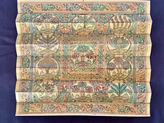 Intricately hand-painted Pattachitra art on palm leaves, depicting traditional motifs and mythological stories with fine detailing.