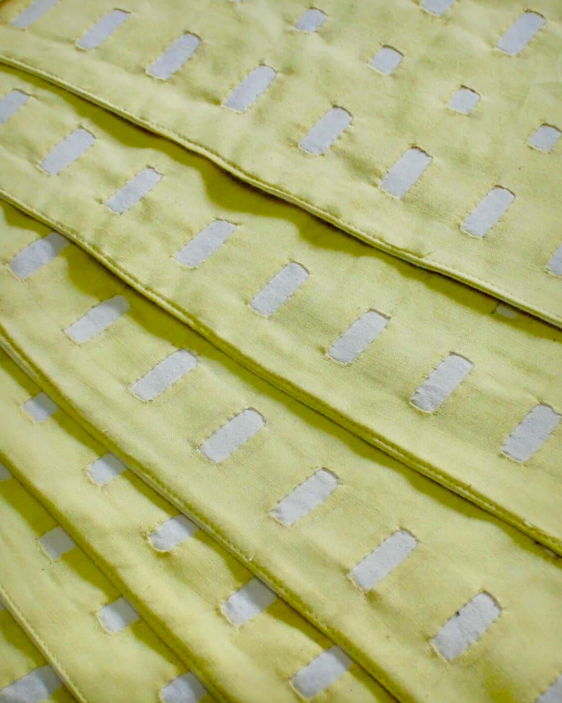 Handcrafted Appliqué work on placemats and napkins set, featuring intricate designs and vibrant colors. A beautiful fusion of traditional craftsmanship and modern elegance to enhance your dining experience.