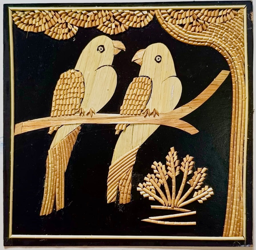 Handcrafted Sikki art wall decor featuring intricate designs woven from natural golden grass, showcasing traditional craftsmanship.