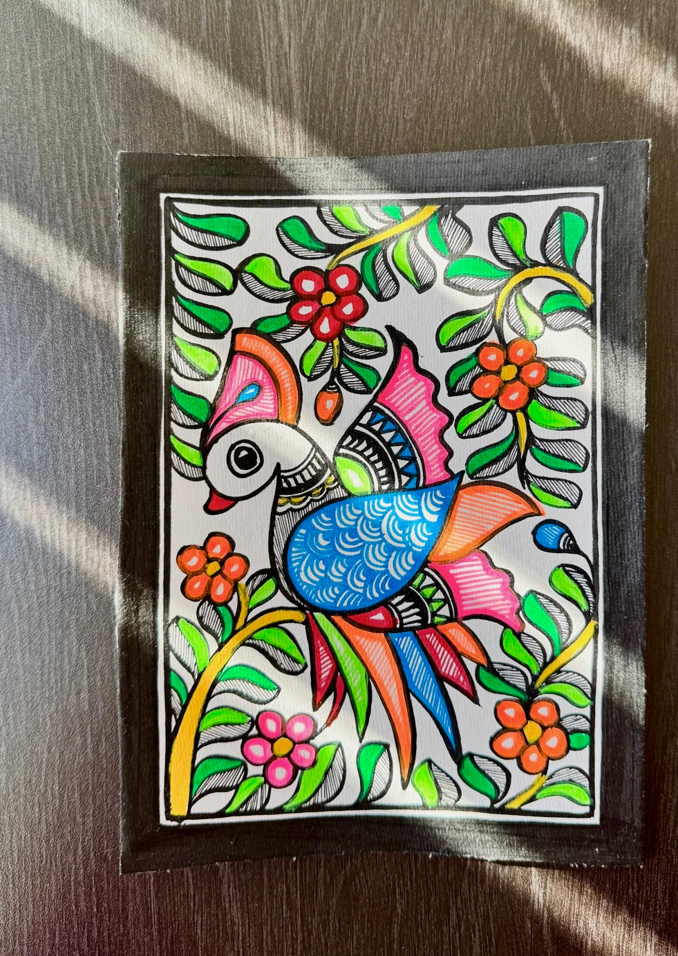 Charming small-sized Madhubani art paintings, featuring intricate hand-painted designs with vibrant colors and traditional motifs. A perfect blend of cultural heritage and artistic beauty to enhance your space.
