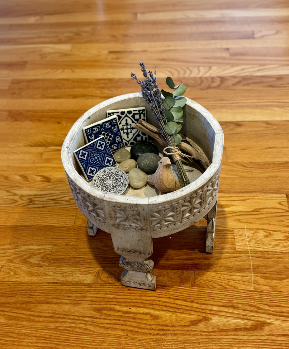 Decorative wood stool with plants and decorative items on a wooden floor
