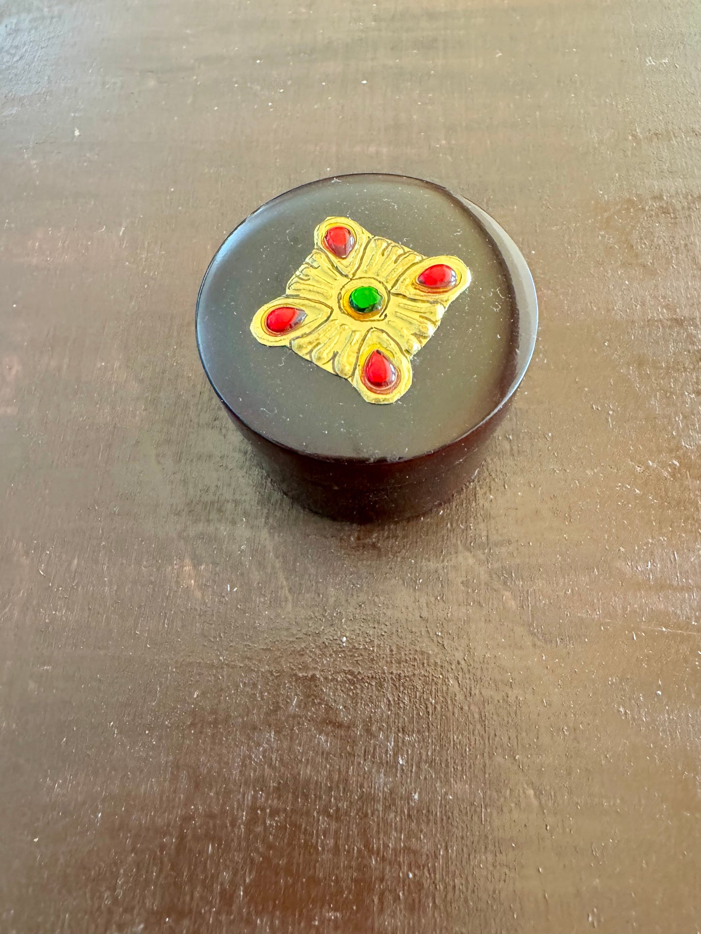 Exquisite Tanjore work wooden boxes in various shapes, featuring intricate gold detailing and traditional Indian artistry.