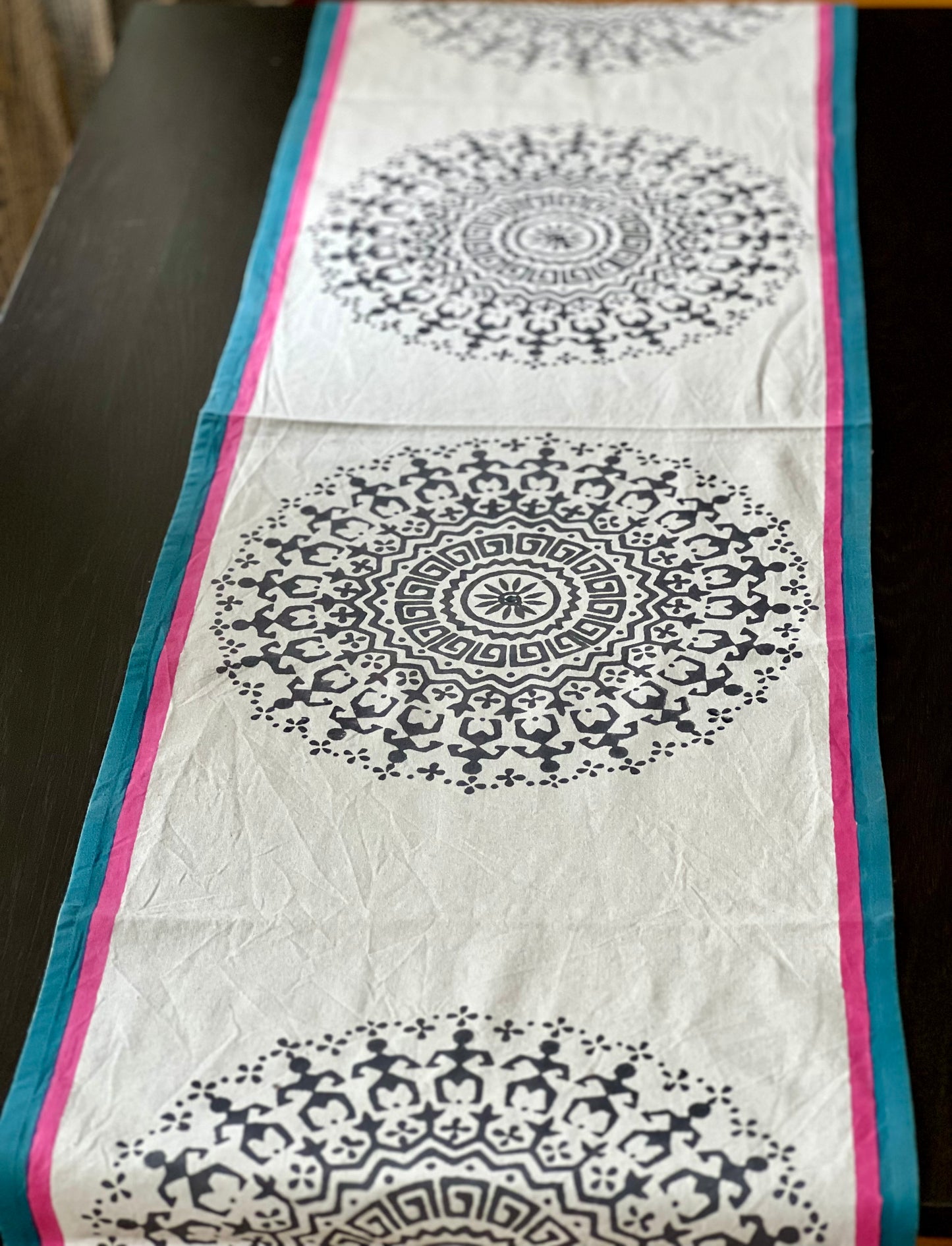Pure cotton hand block printed table runner, featuring intricate patterns and vibrant colors, adding a touch of traditional craftsmanship to your dining decor.