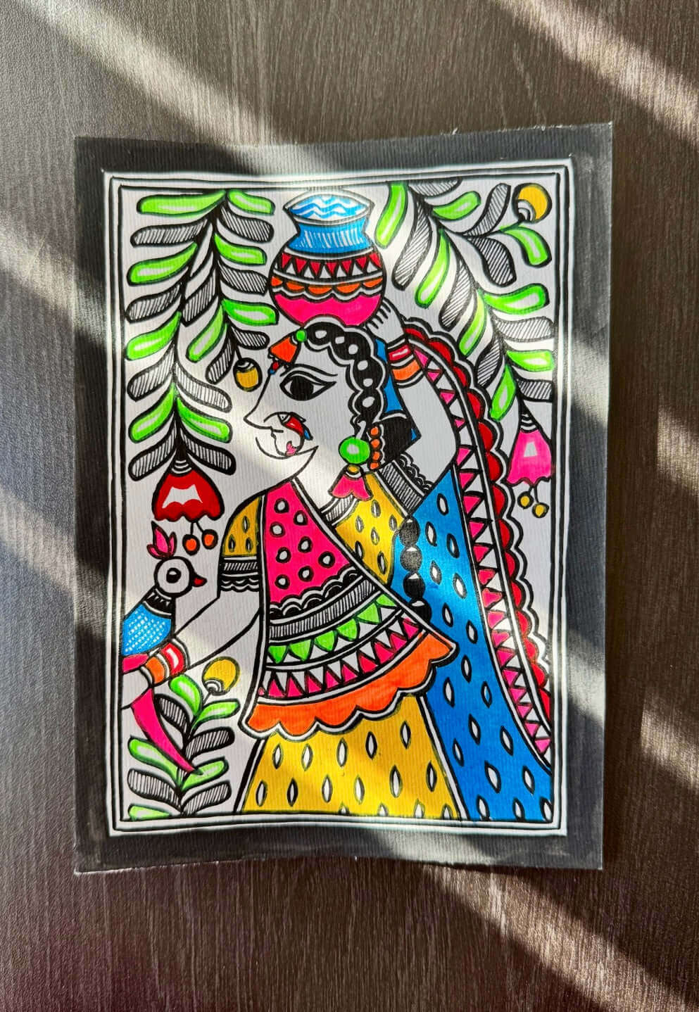 Charming small-sized Madhubani art paintings, featuring intricate hand-painted designs with vibrant colors and traditional motifs. A perfect blend of cultural heritage and artistic beauty to enhance your space.