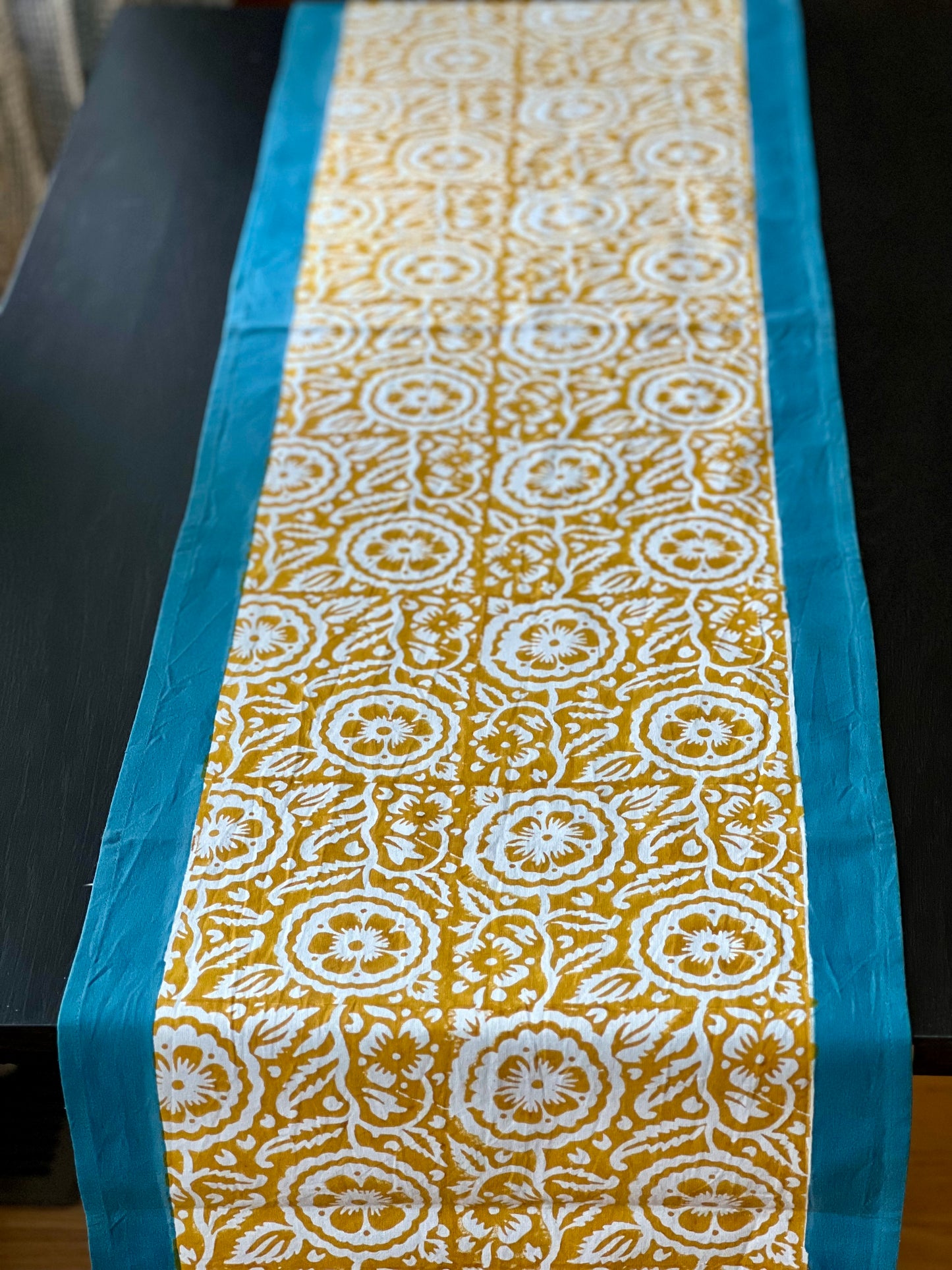 Pure cotton hand block printed table runner, featuring intricate patterns and vibrant colors, adding a touch of traditional craftsmanship to your dining decor.
