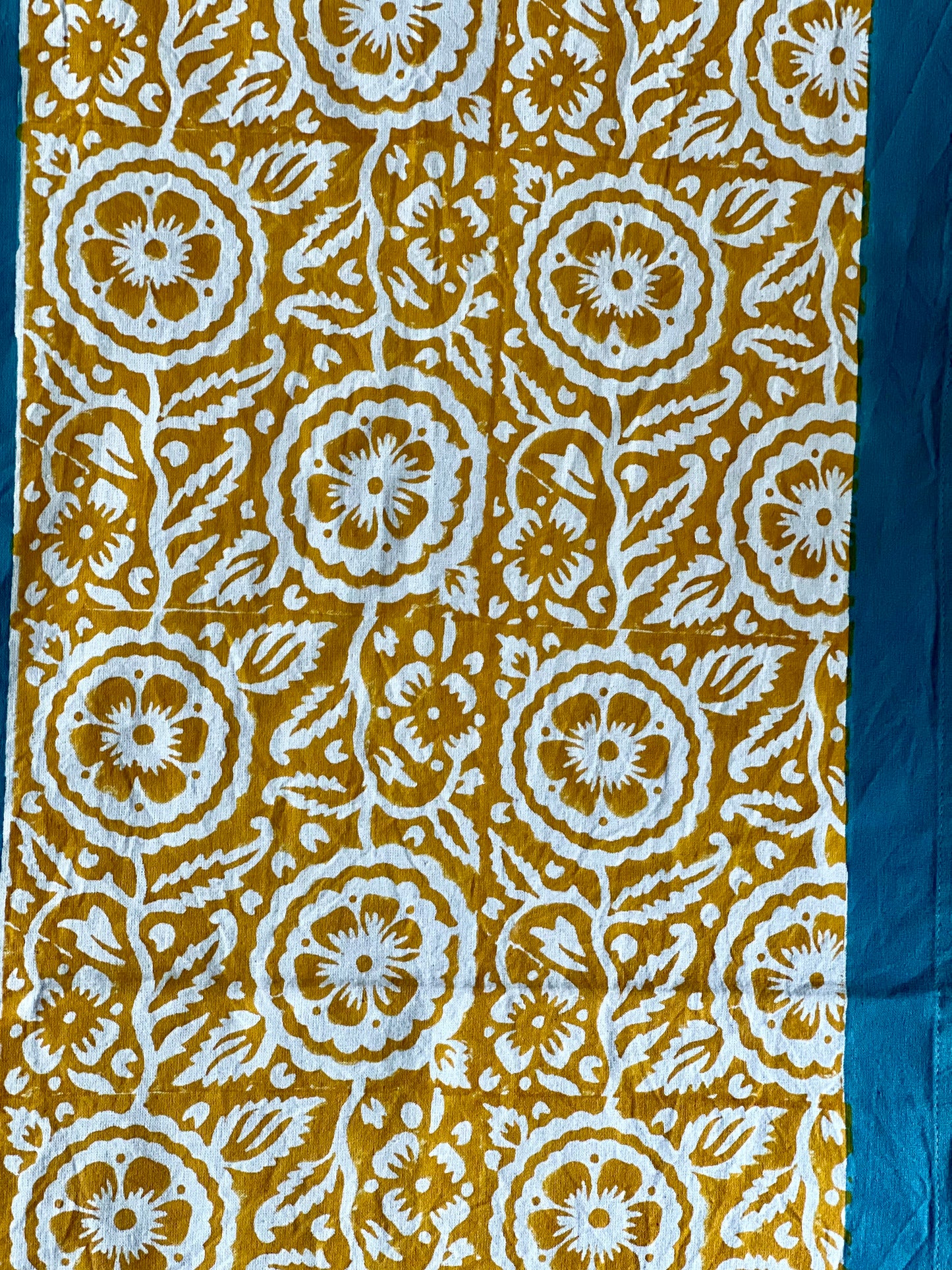 Pure cotton hand block printed table runner, featuring intricate patterns and vibrant colors, adding a touch of traditional craftsmanship to your dining decor.