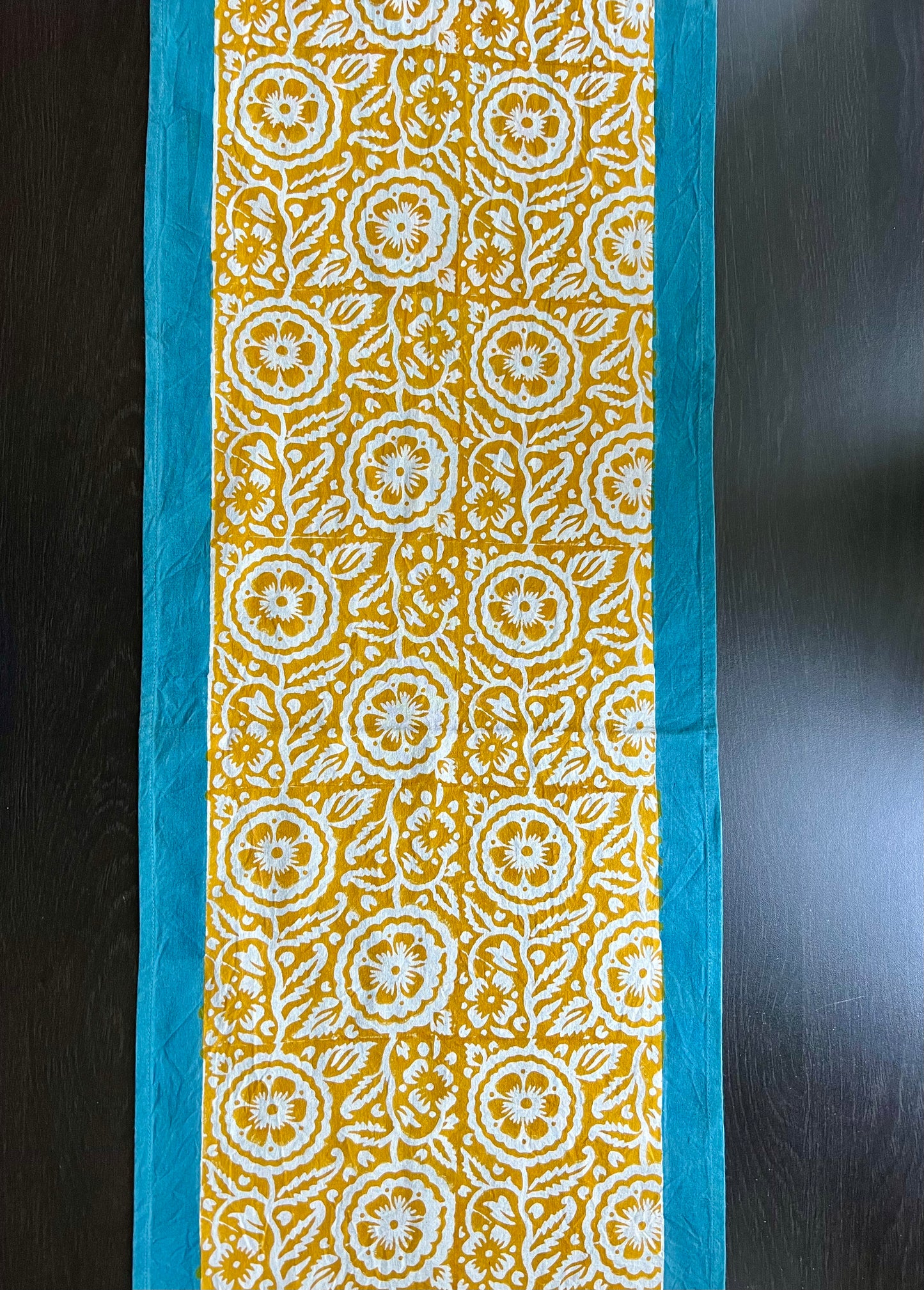 Pure cotton hand block printed table runner, featuring intricate patterns and vibrant colors, adding a touch of traditional craftsmanship to your dining decor.