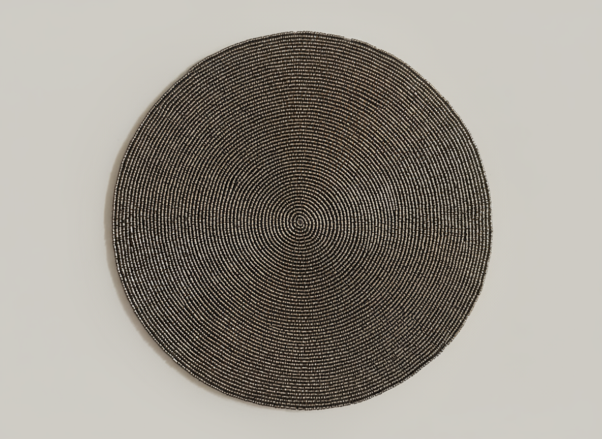 Round woven placemat on a light gray background