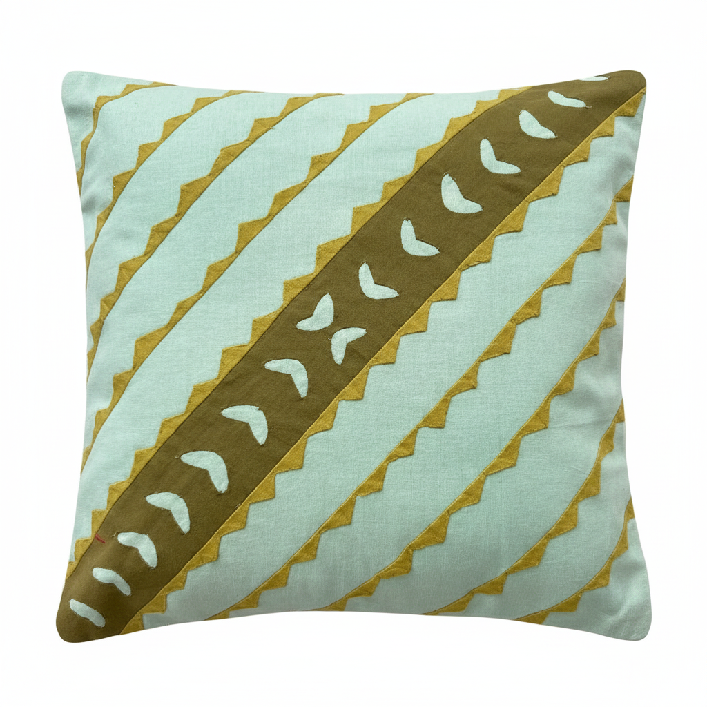 Decorative pillow with gold and white pattern on a light blue background