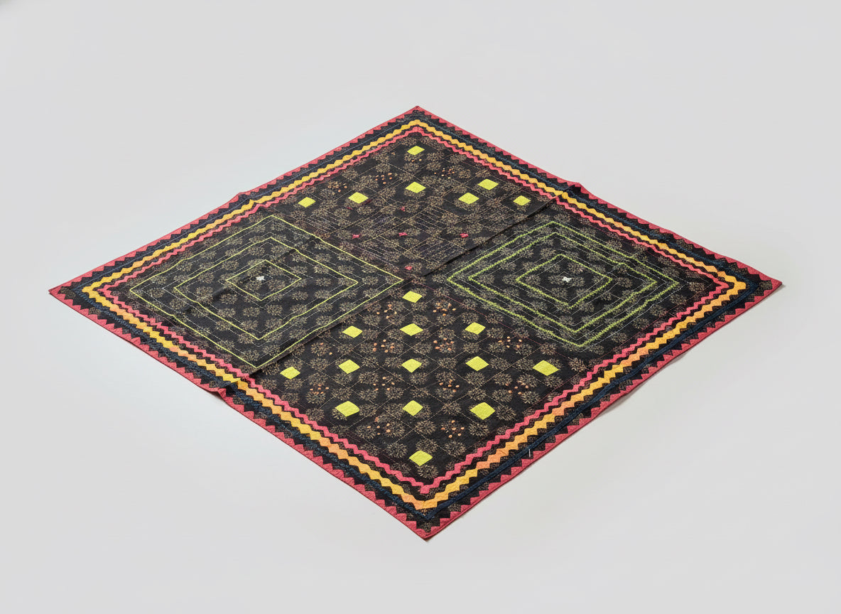 Elegant Appliqué work on tablecloths, showcasing intricate designs and vibrant colors. A stunning blend of traditional craftsmanship and contemporary style to elevate your dining space.