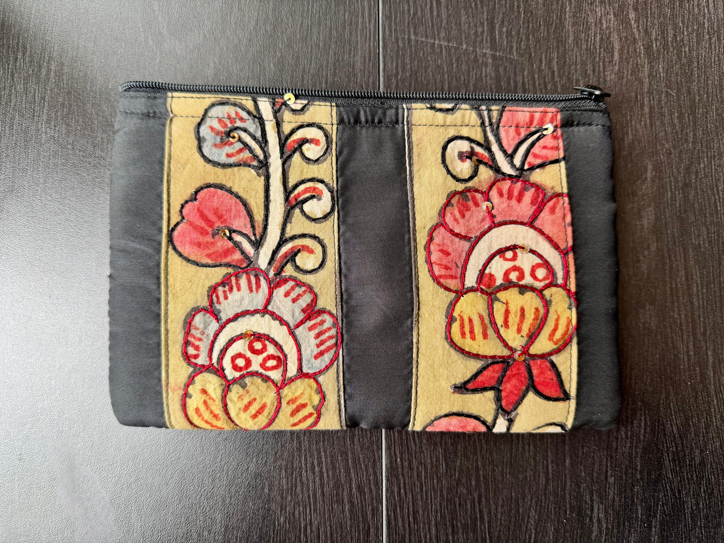Black make up pouch with hand painted Kalamkari design