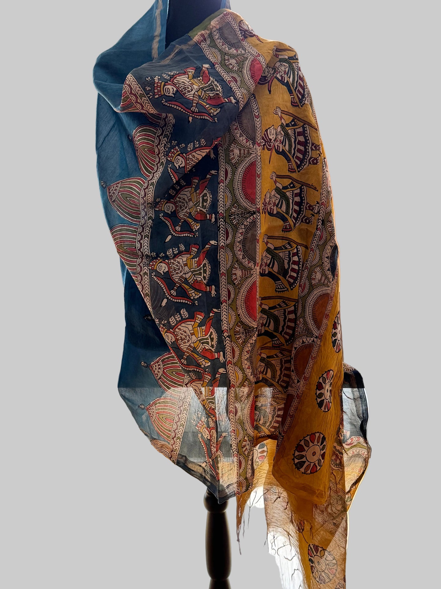 Traditional patterned Mata ni Pachhedi art hand painted stole draped over a mannequin.