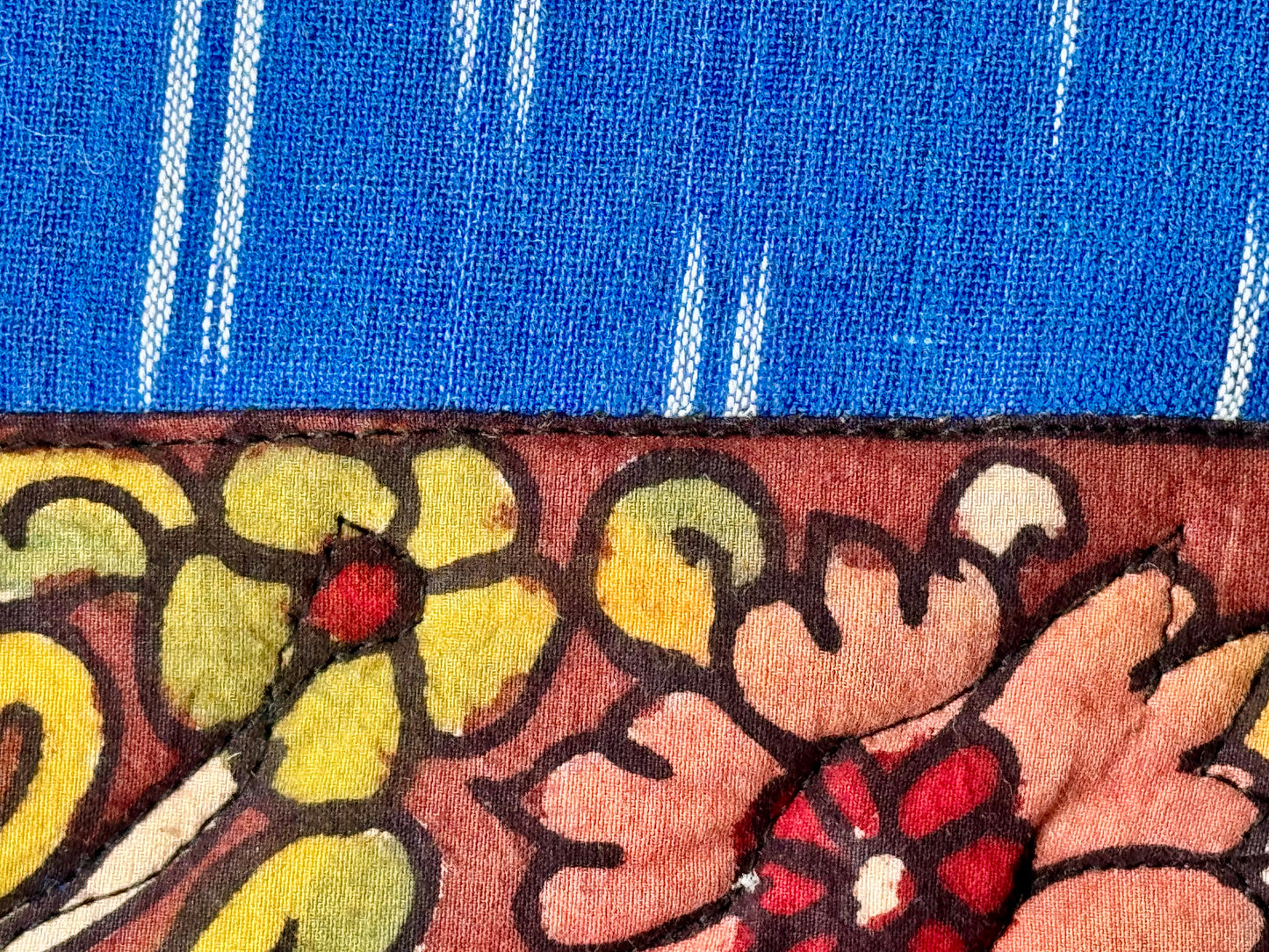 Hand painted kalamkari close up on blue make up pouch