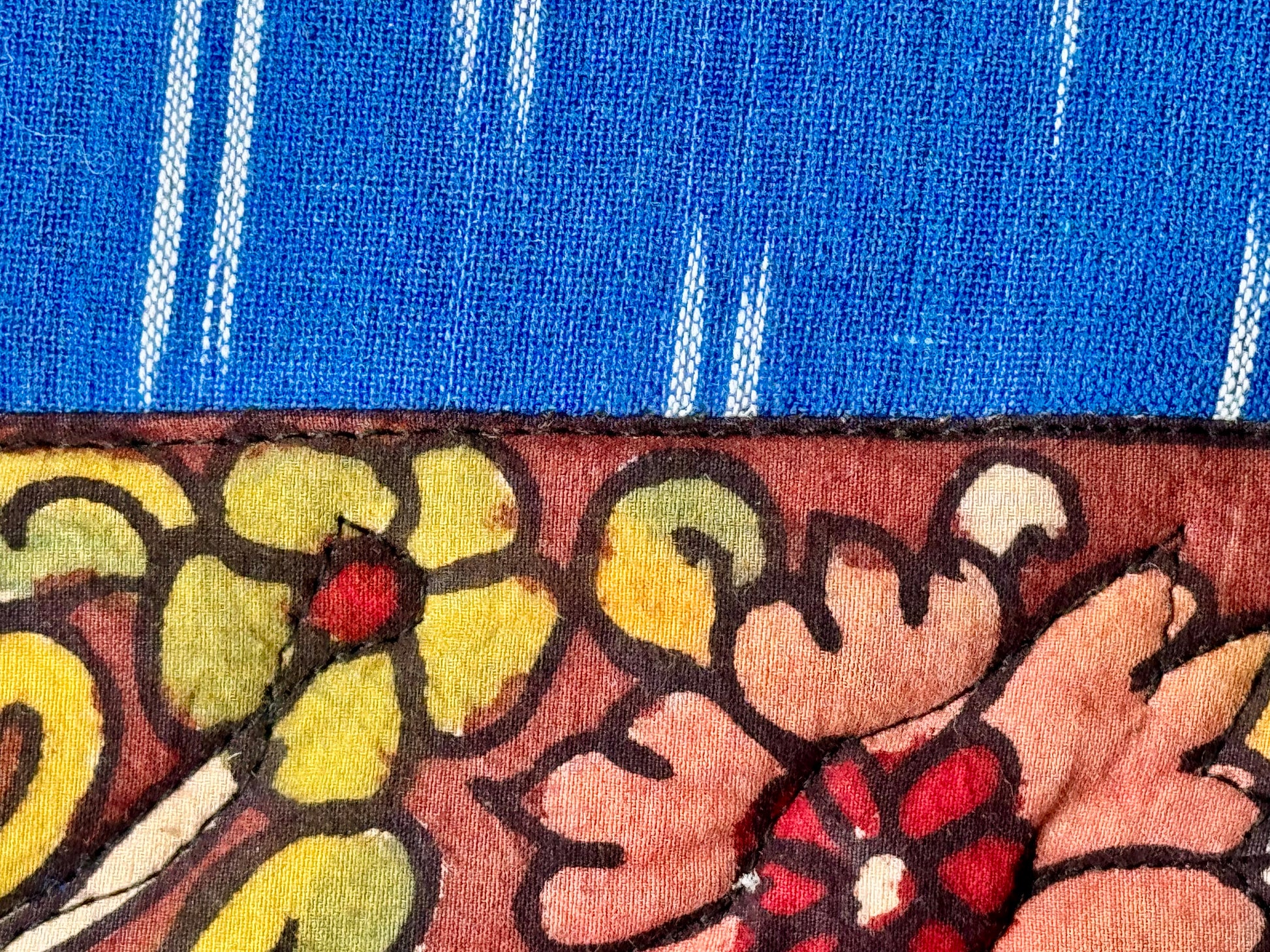 Hand painted kalamkari close up on blue make up pouch