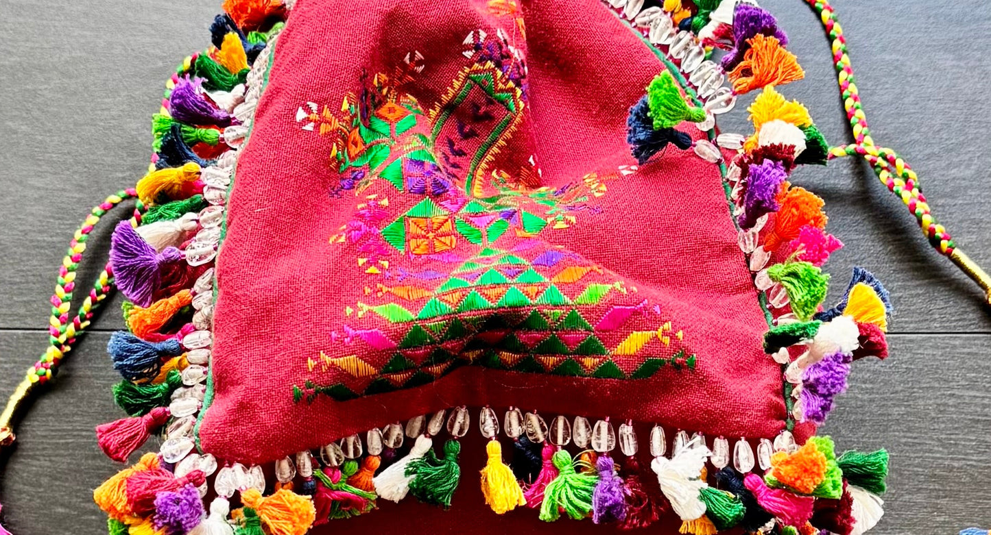 Crimson Kutchi Soof embroidery batwa with embroidered panels and tassel trim