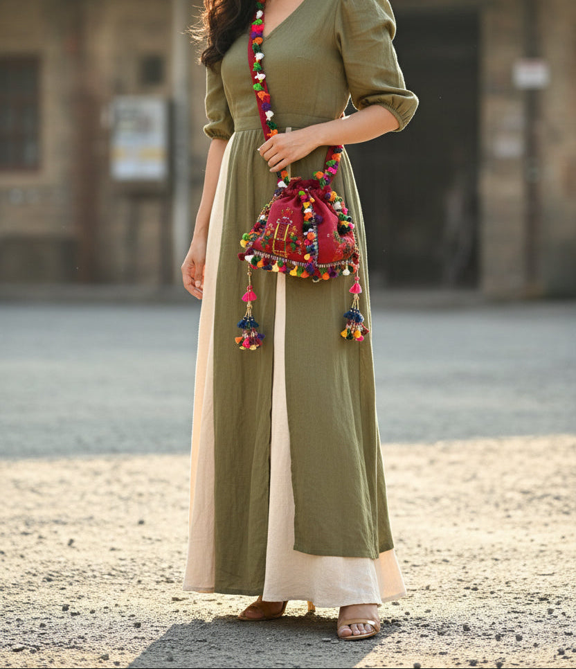 Crimson Kutchi Soof embroidery batwa with embroidered panels and tassel trim