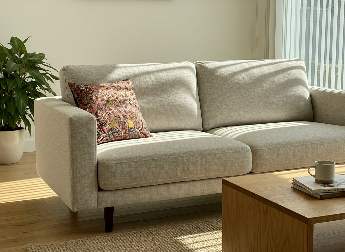 Patterned pillow on a wooden table with cloth