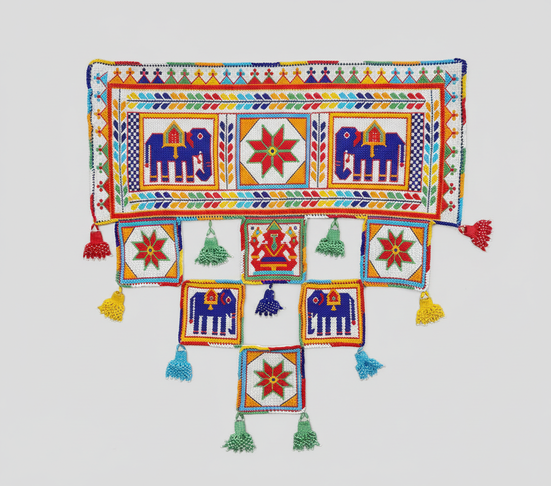 Colorful embroidered textile with Pearl work patterns and tassels on a light gray background