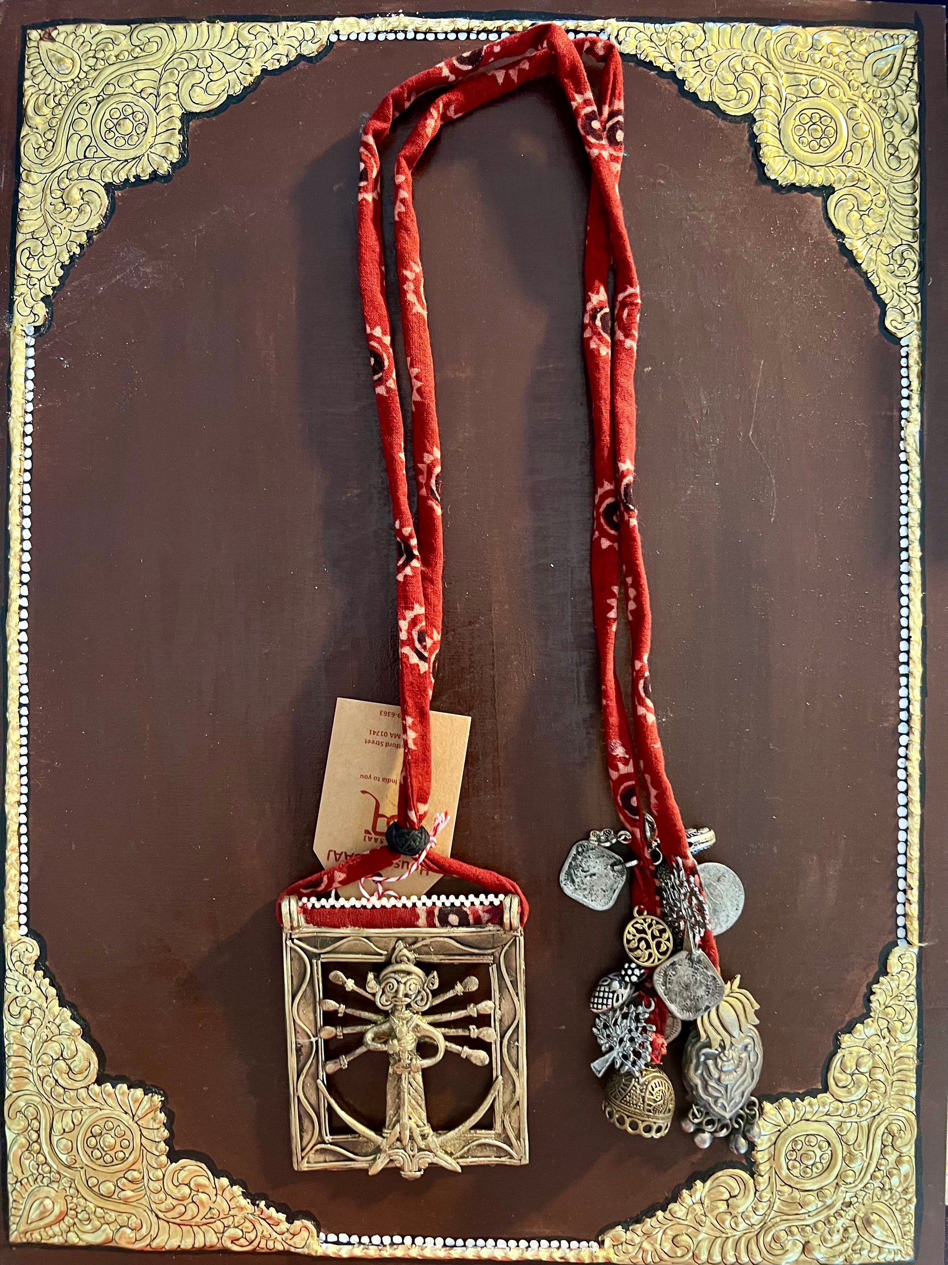 Eco-friendly upcycled handmade Dhokra pendant necklaces, featuring unique tribal metalwork and intricate designs, blending sustainability with traditional artistry.