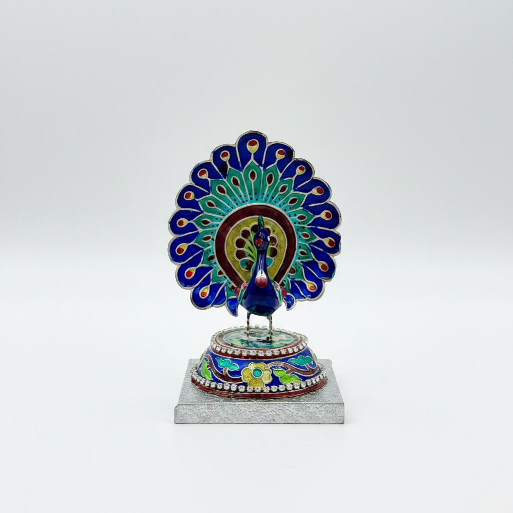 Decorative Gulabi Meenakari silver peacock figure on a white background