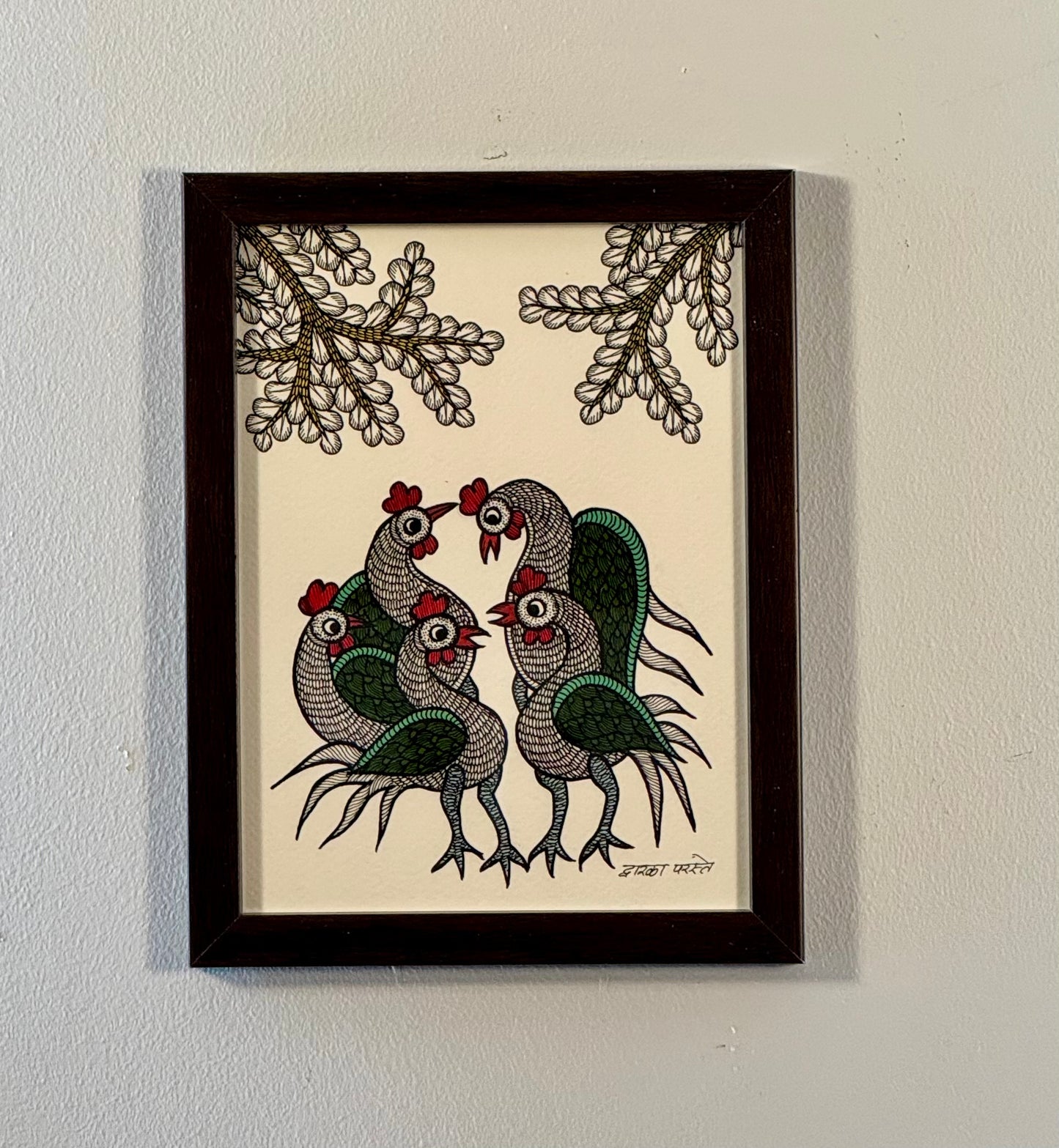 Hand-painted Gond art wall decor featuring intricate tribal patterns and vibrant storytelling inspired by nature and folklore.