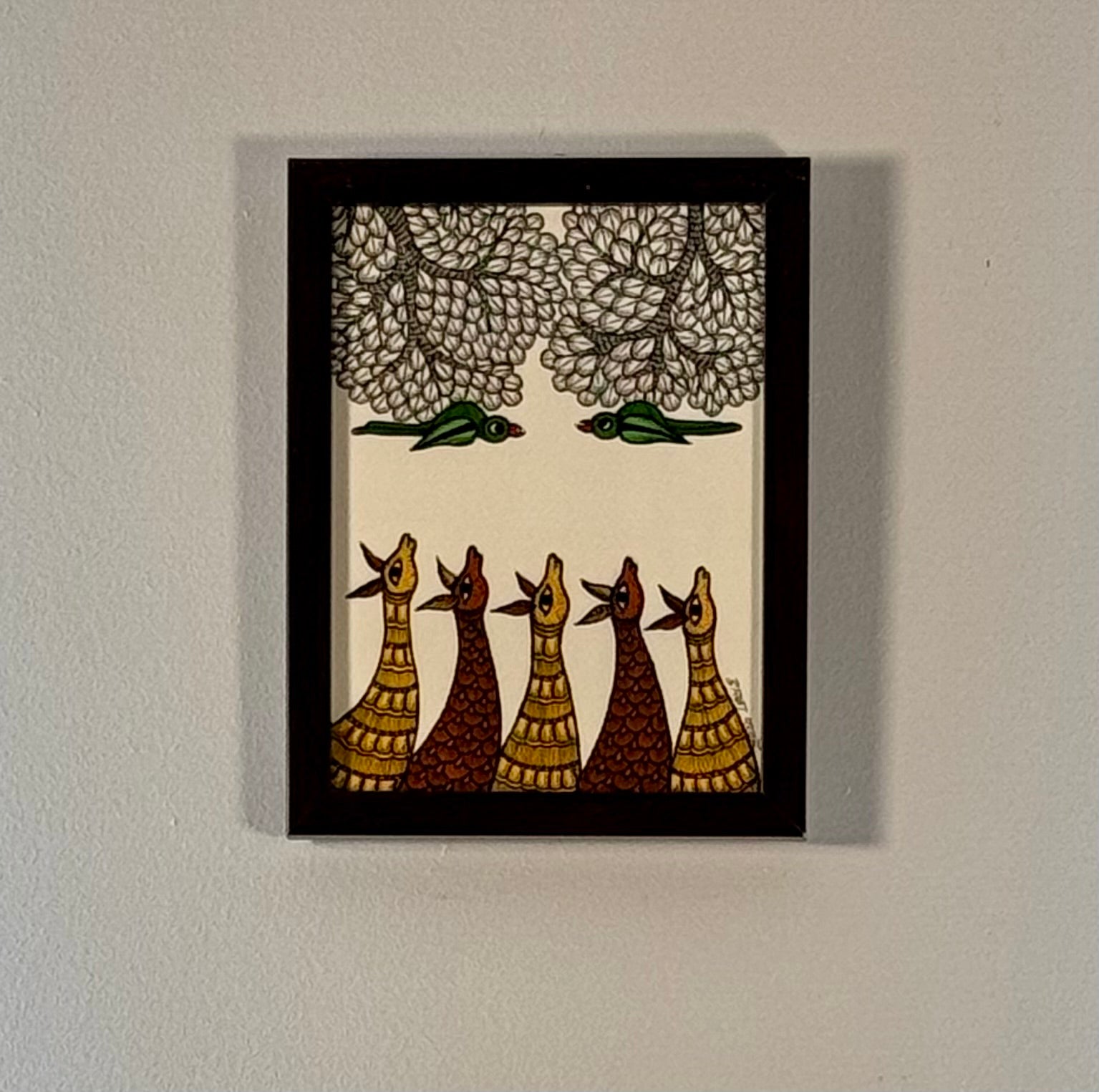 Hand-painted Gond art wall decor featuring intricate tribal patterns and vibrant storytelling inspired by nature and folklore.